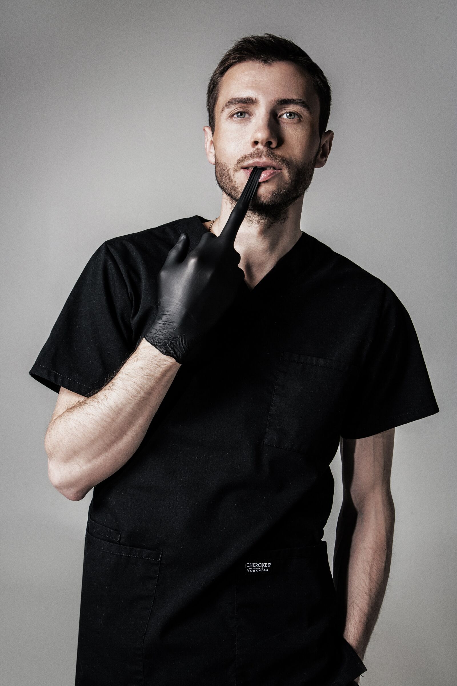 Canon EF 24-105mm F4L IS USM sample photo. Surgeon, man, black gloves photography