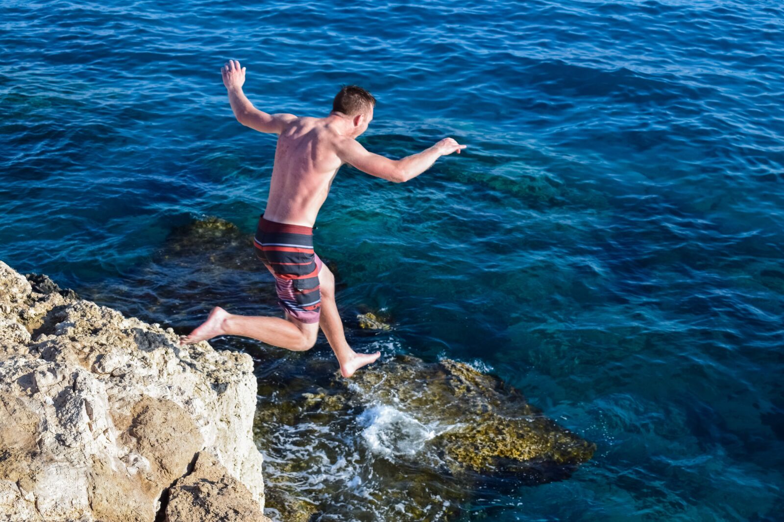 Nikon D3300 sample photo. Jump, rock, cliff photography