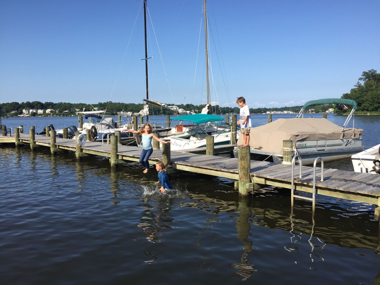 iPhone 6 back camera 4.15mm f/2.2 sample photo. Pier, river, boat photography