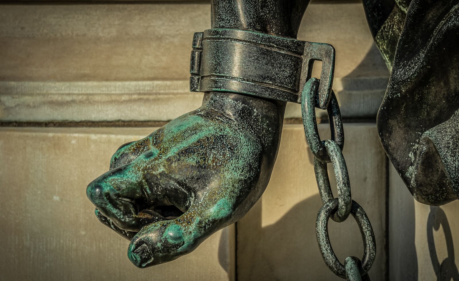 Sony E 55-210mm F4.5-6.3 OSS sample photo. Hand, handcuffs, tied up photography