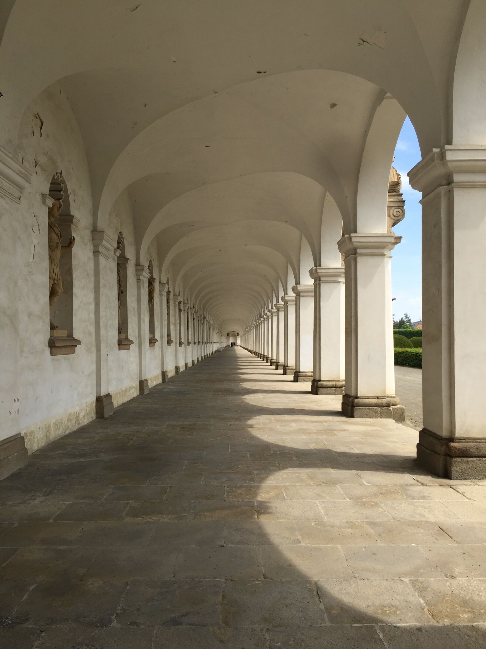 iPhone 6 Plus back camera 4.15mm f/2.2 sample photo. Colonade, sky, architecture photography