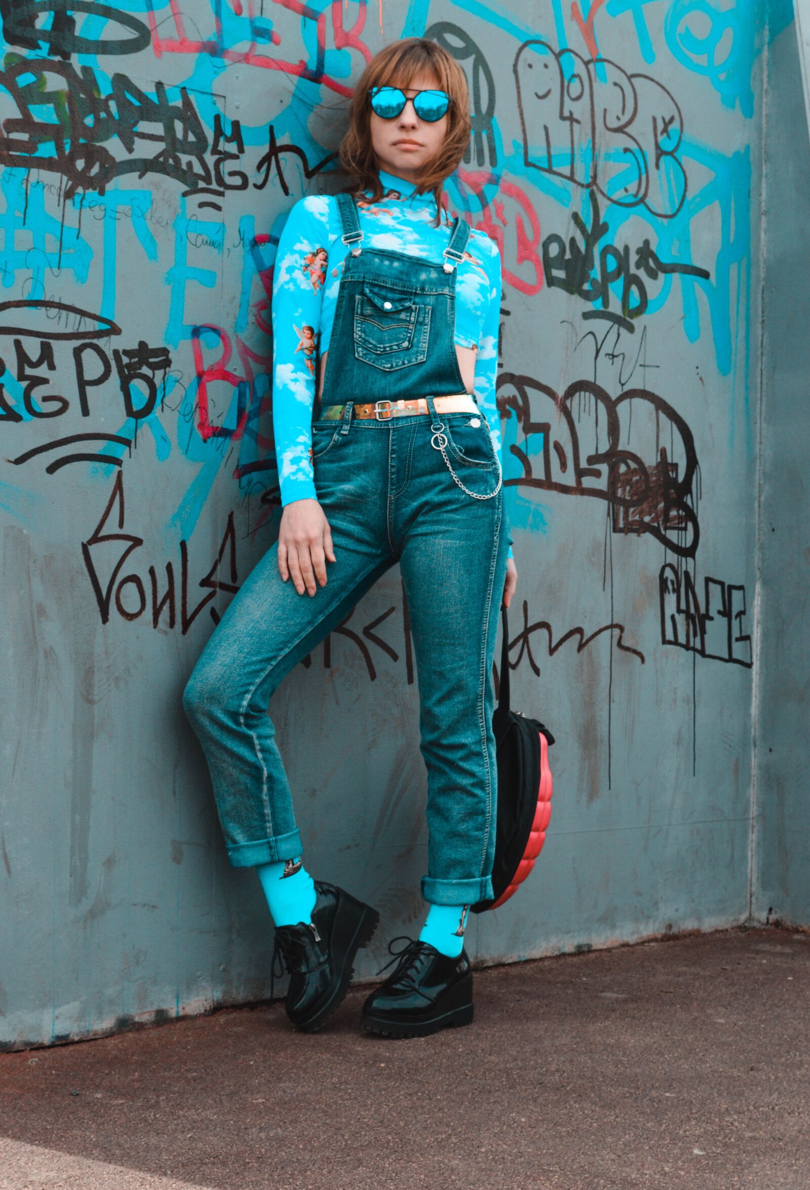 Nikon D3200 sample photo. Denim jumpsuit, backpack, graffiti photography