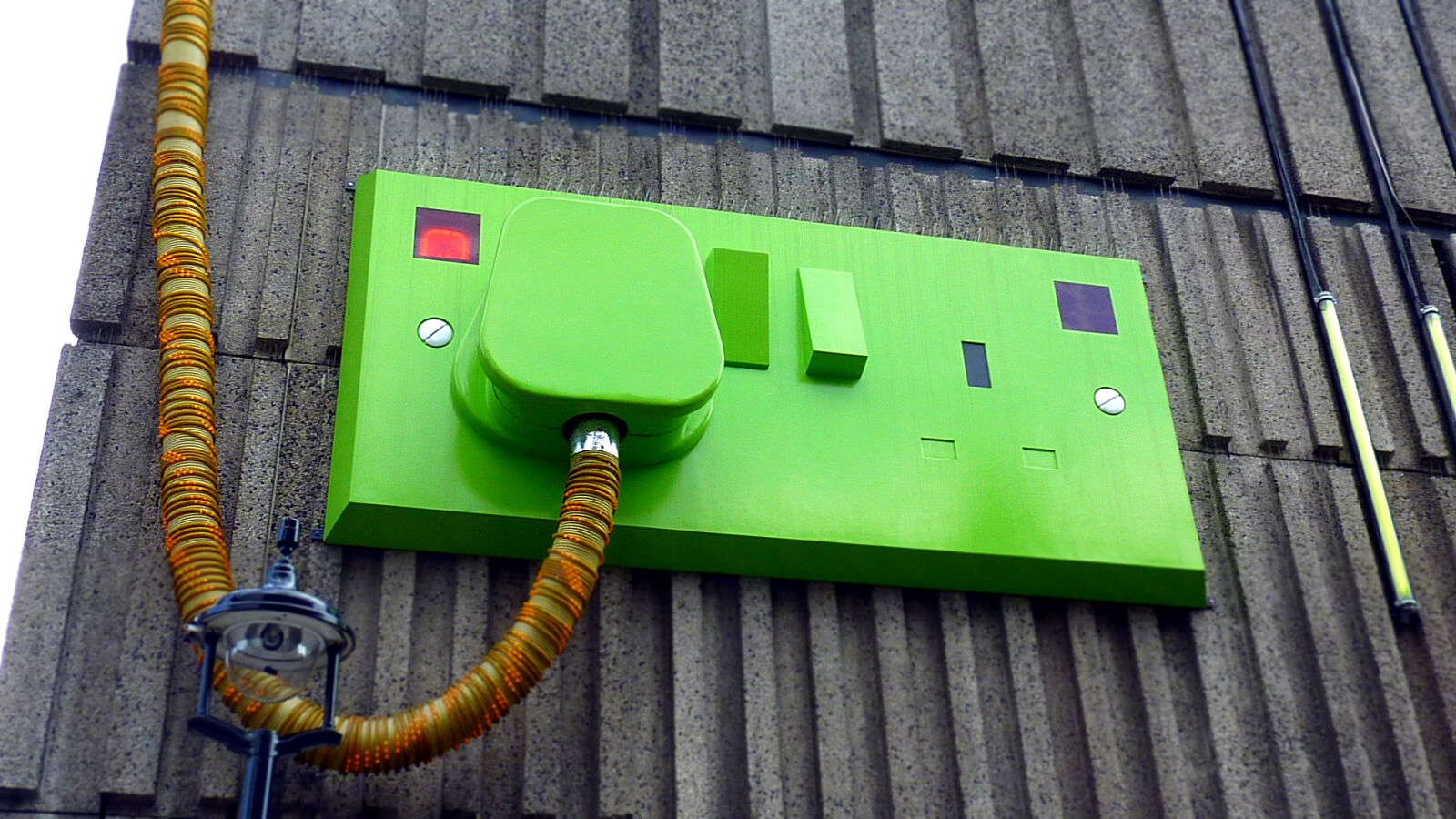 Panasonic DMC-TZ7 sample photo. Green, rectangular, corded, machine photography