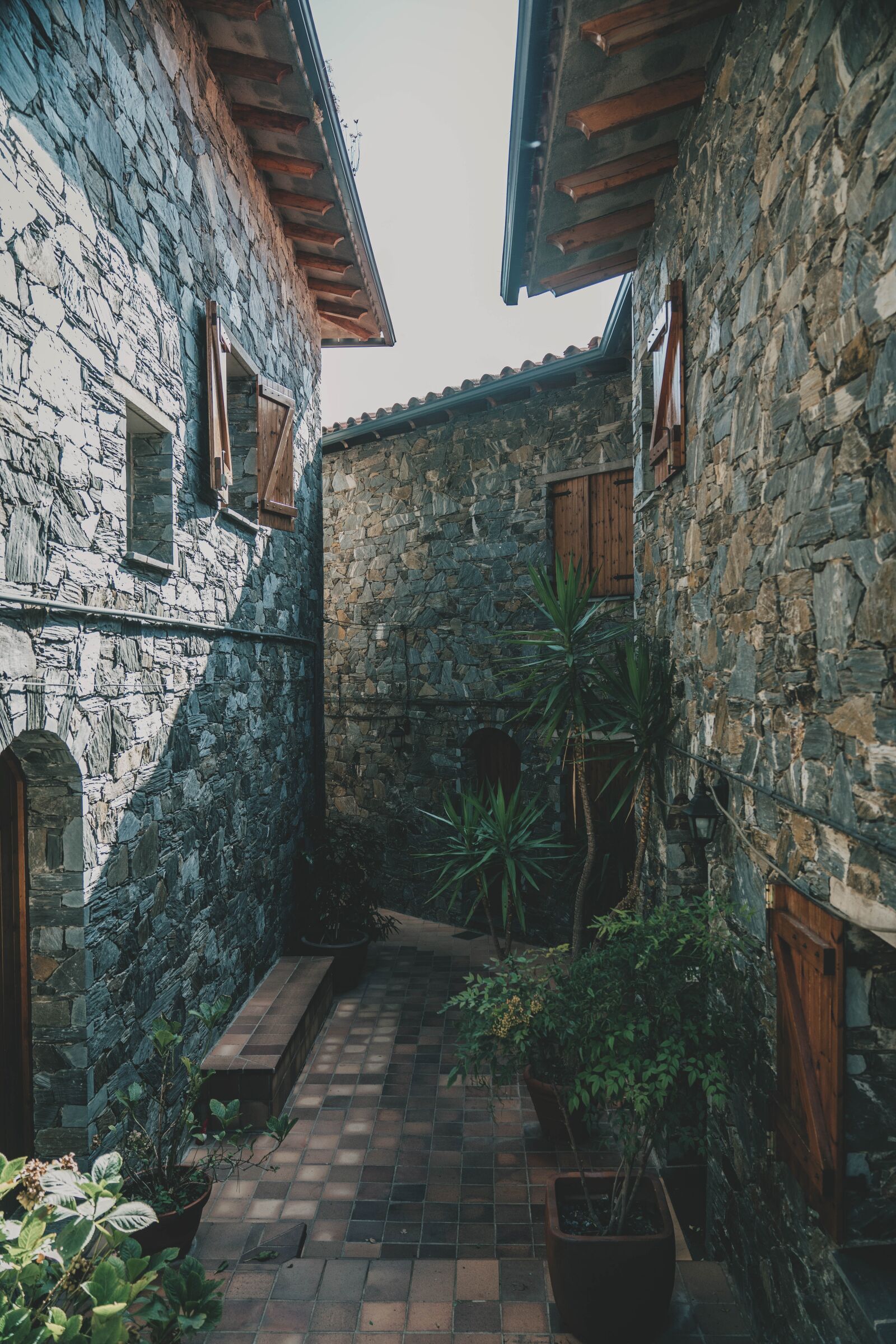 Sony a7R II + Sony FE 24-70mm F2.8 GM sample photo. Montseny, houses stones, people photography