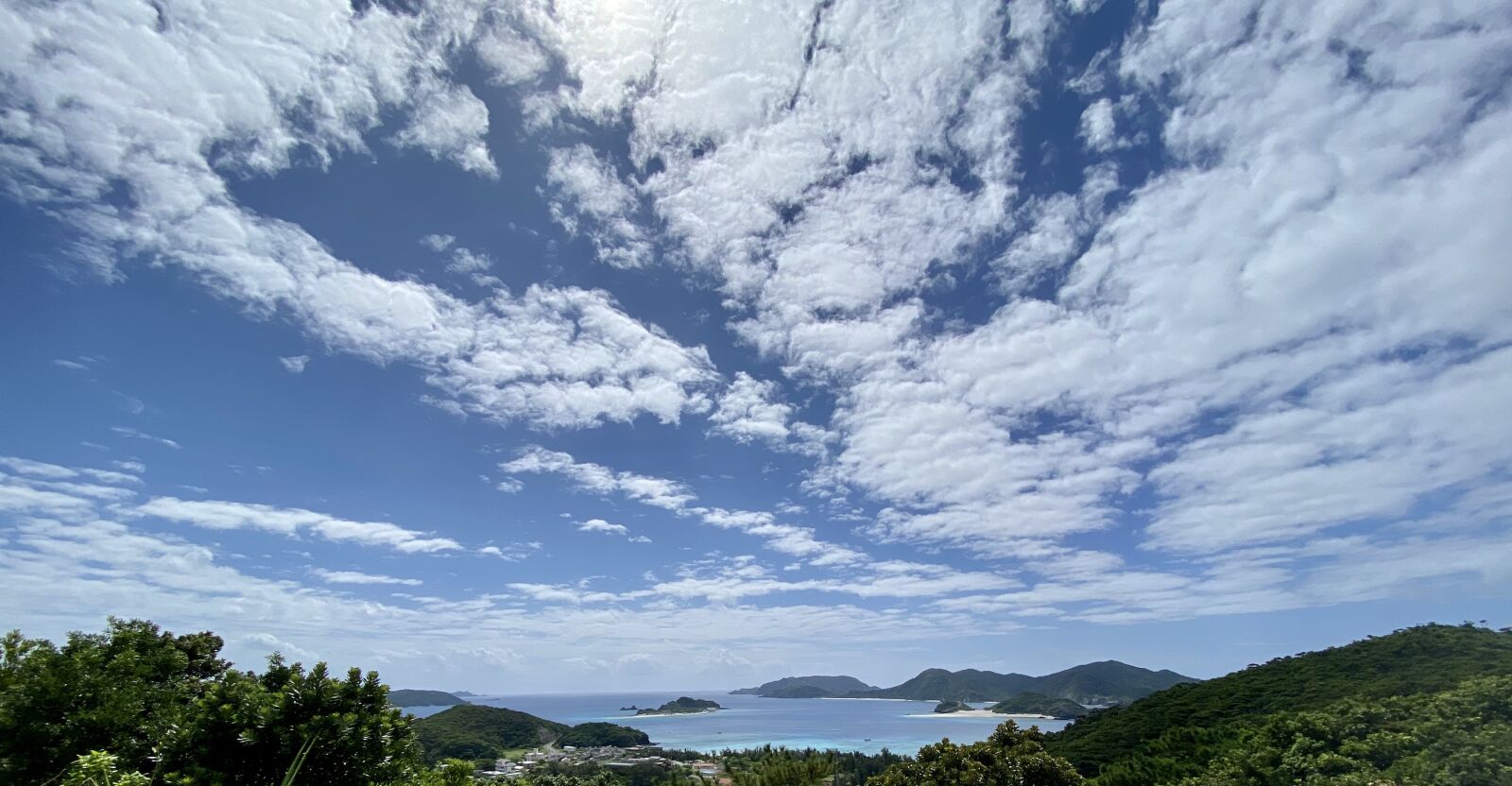 iPhone 11 Pro back triple camera 1.54mm f/2.4 sample photo. Sky, okinawa, sea photography