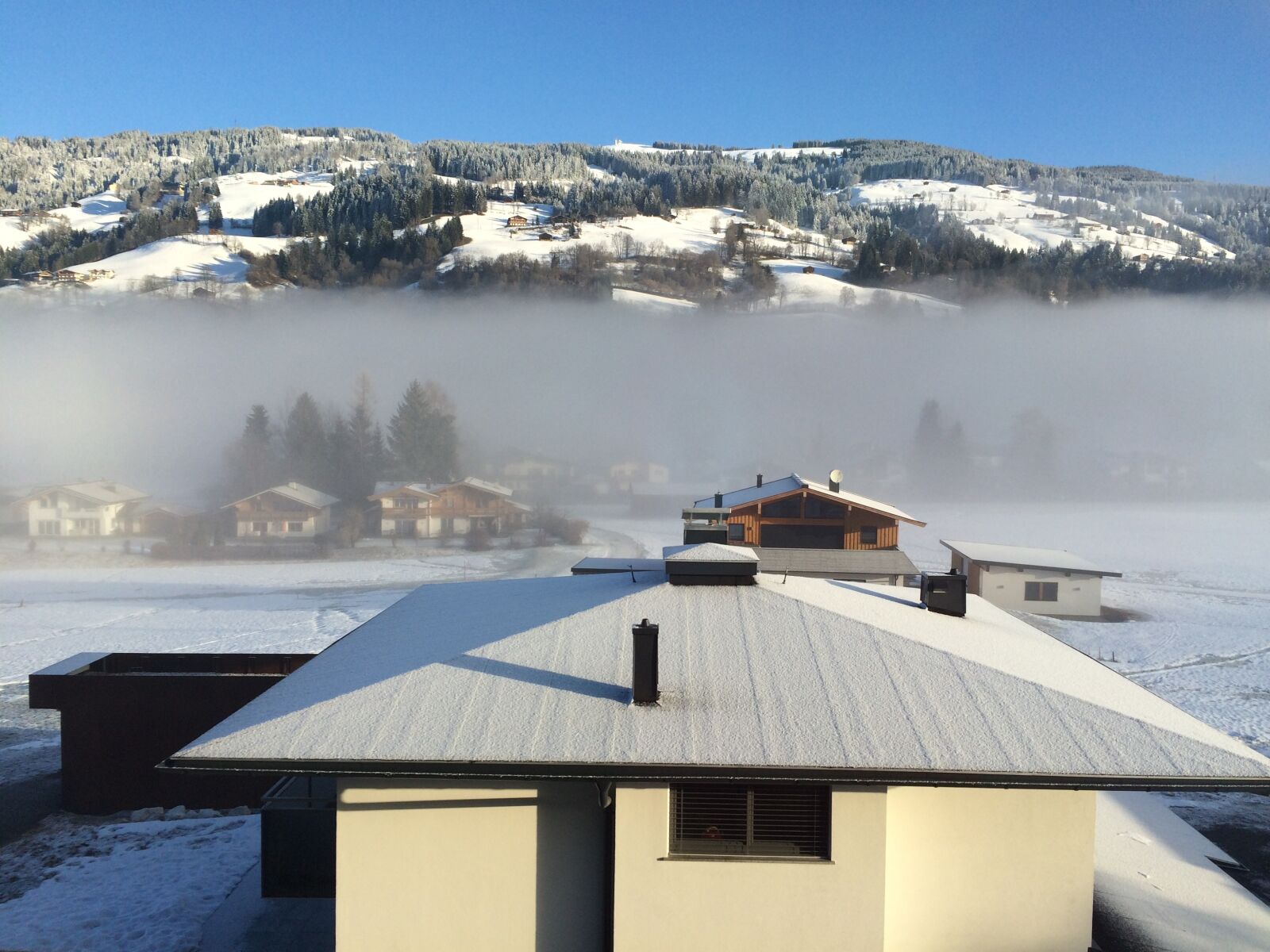 iPhone 5s back camera 4.15mm f/2.2 sample photo. Winter, fog, alps photography