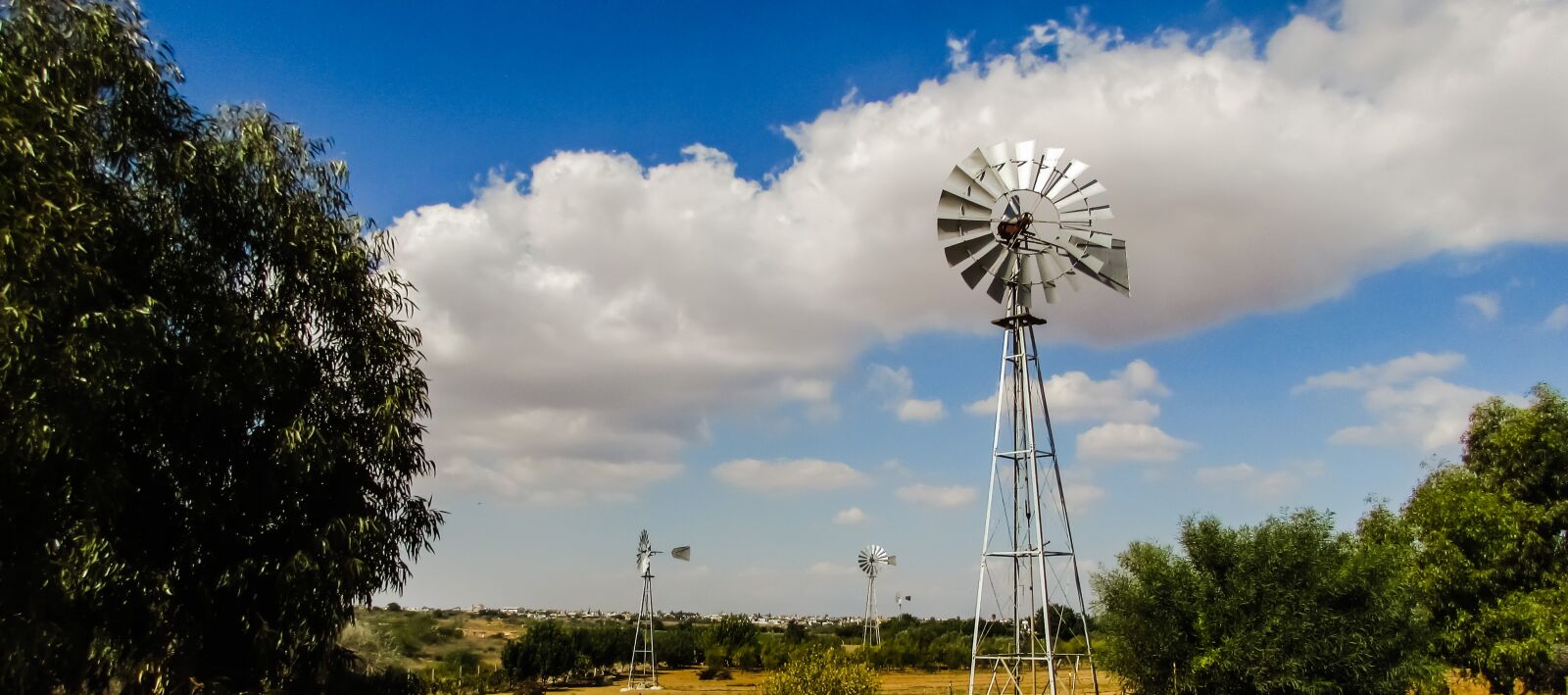 Canon PowerShot SX400 IS sample photo. Windmill, wheel, landscape photography