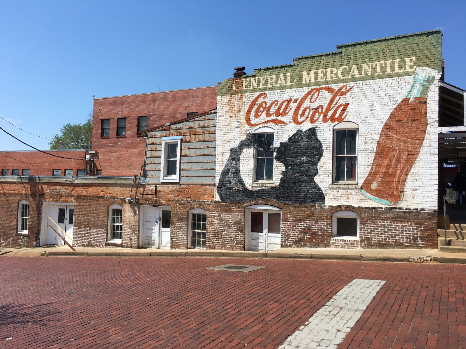 Apple iPhone 6s Plus sample photo. Coke cola, texas, oldest photography