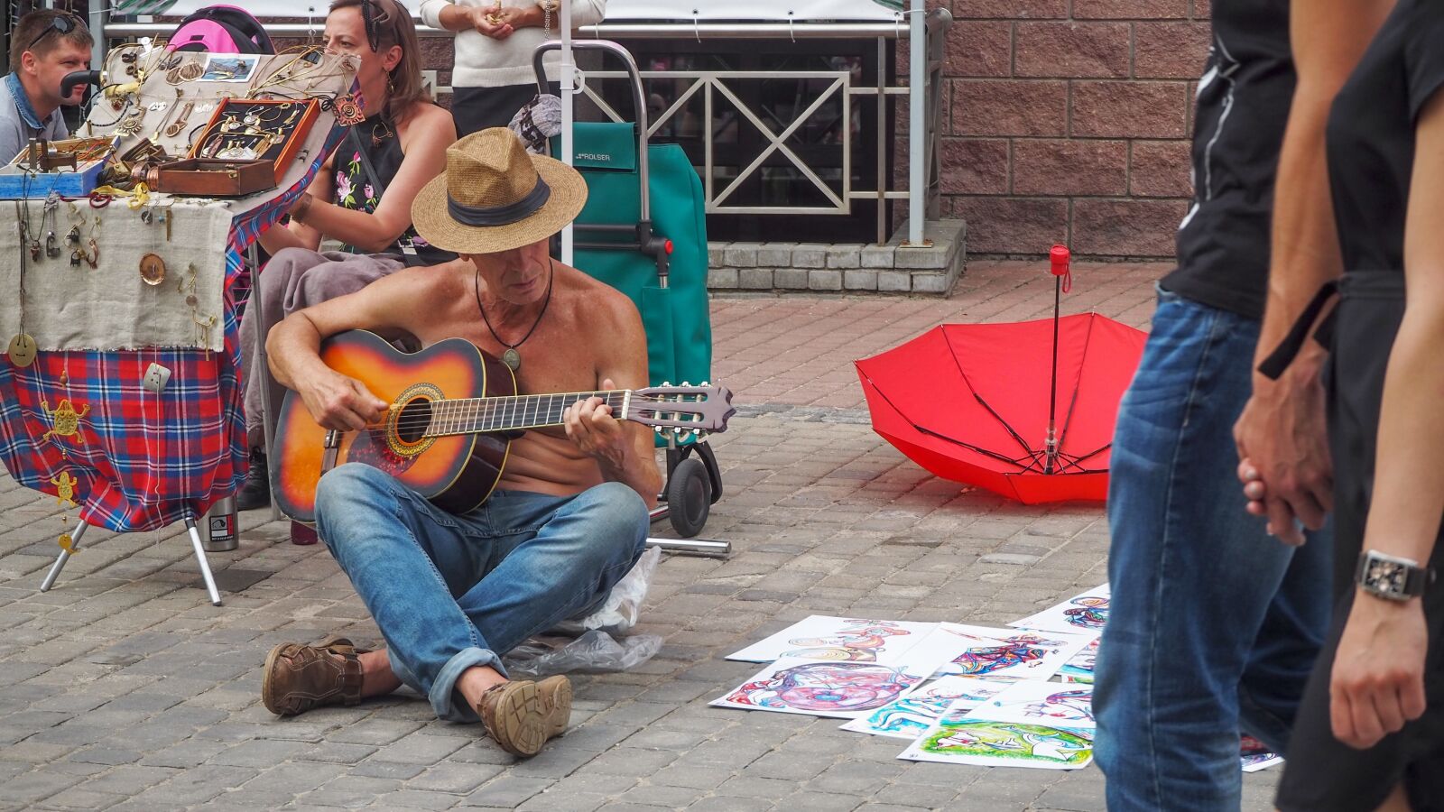 Olympus OM-D E-M10 III sample photo. Playing guitar, man, sitting photography