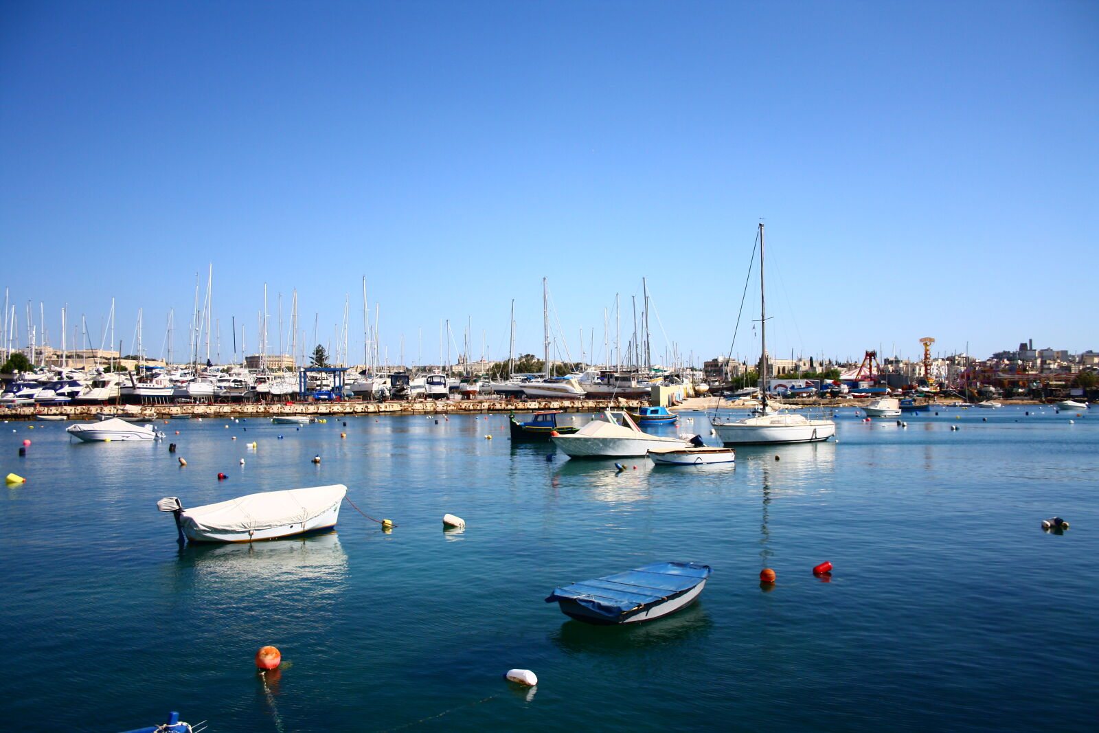 Canon EF-S 18-55mm F3.5-5.6 II sample photo. Blue, boats, harbor, sea photography