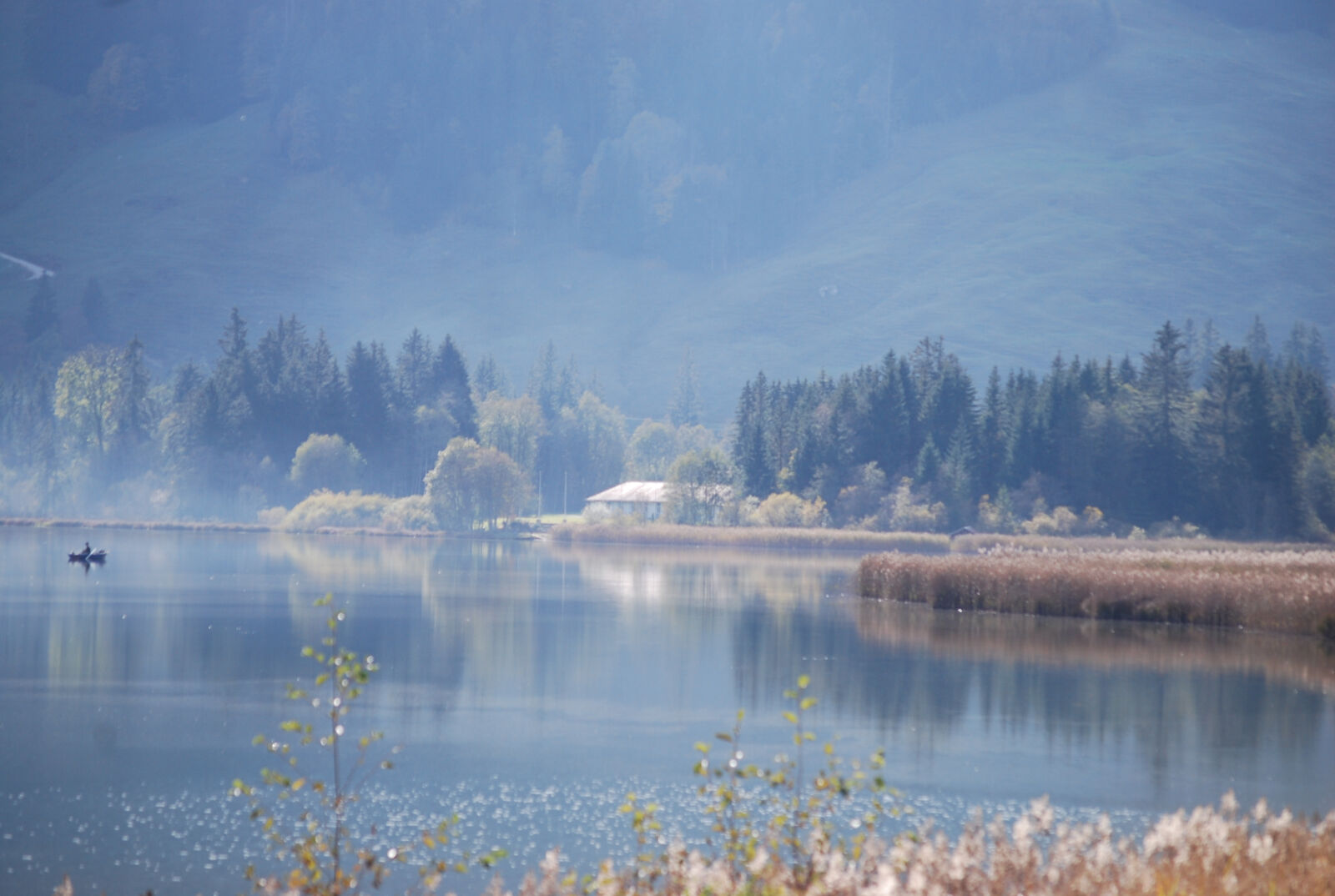 Nikon D40X sample photo. Black, lac, boat, fisherman photography