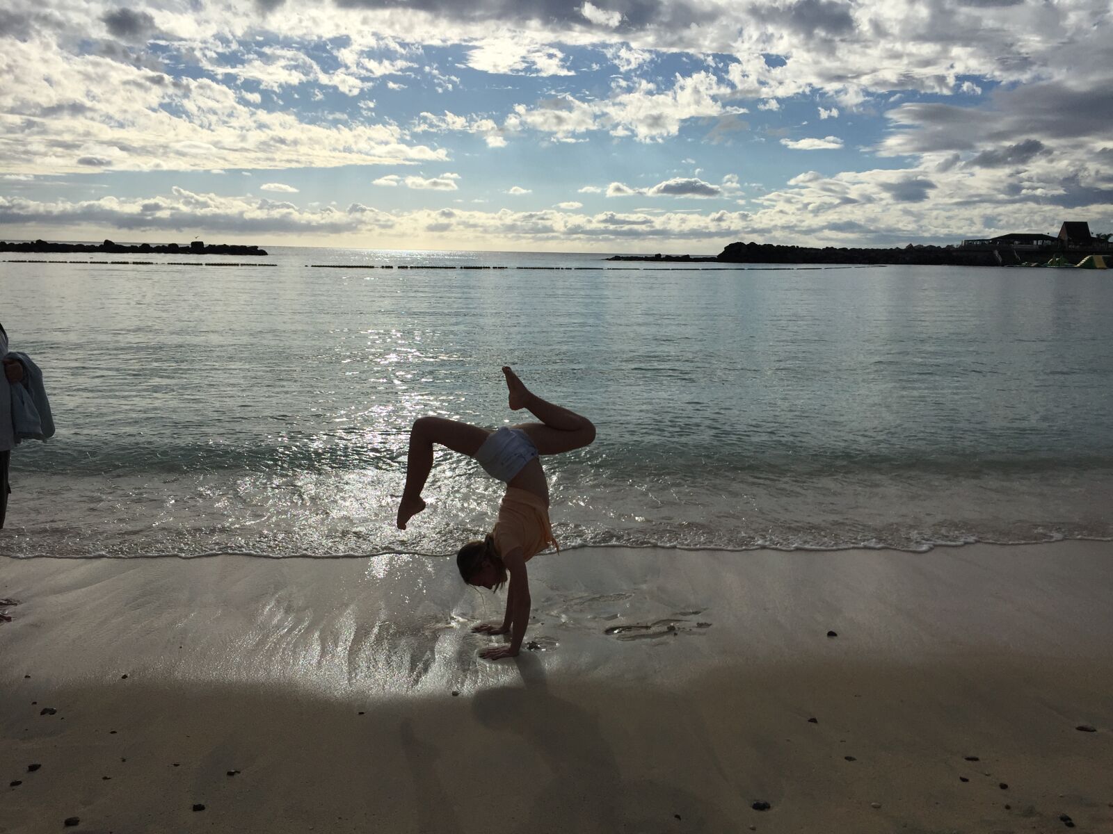 iPhone 6 back camera 4.15mm f/2.2 sample photo. Athletic, girl, beach, coast photography