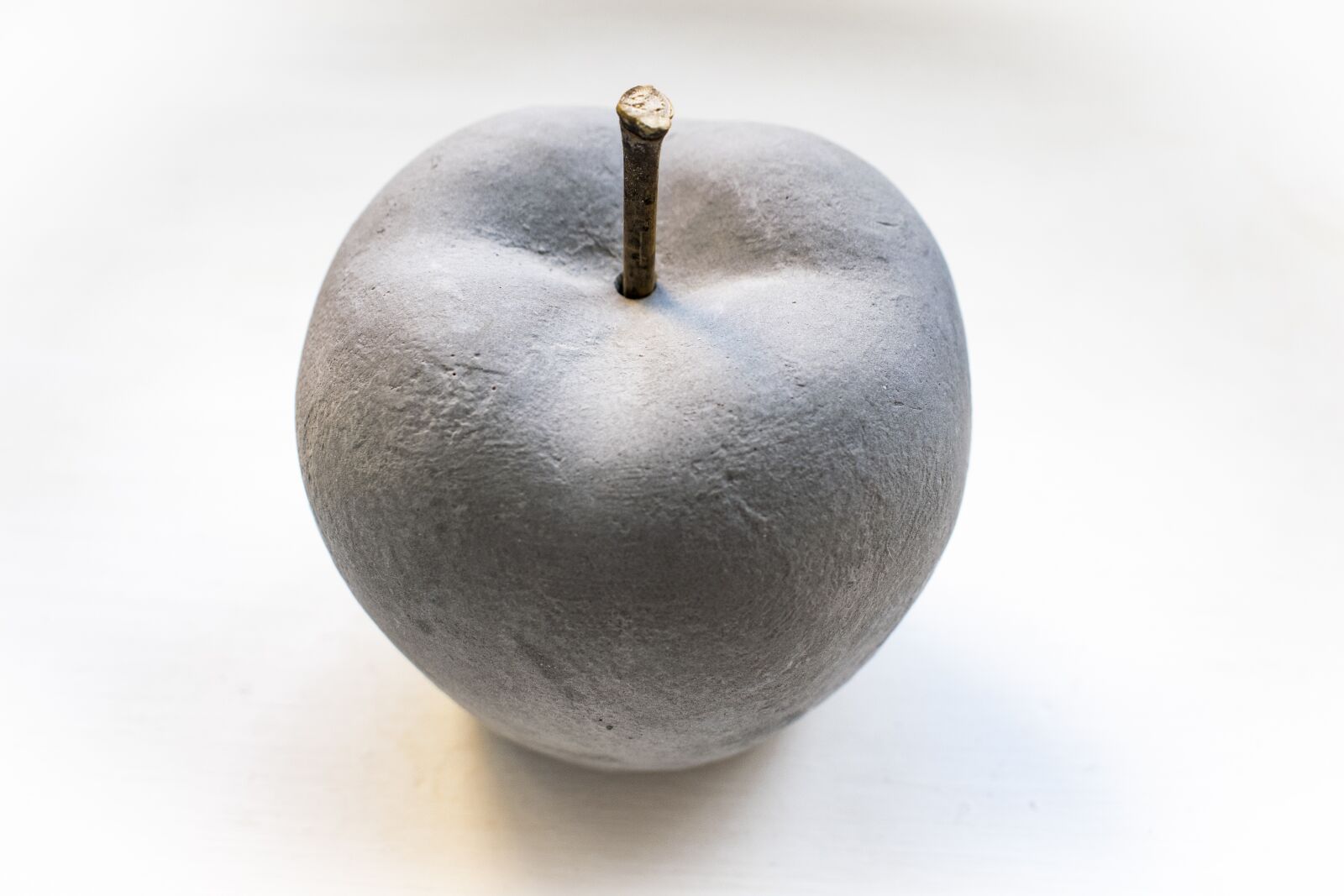 Nikon D5300 sample photo. Apple, stone, grey photography