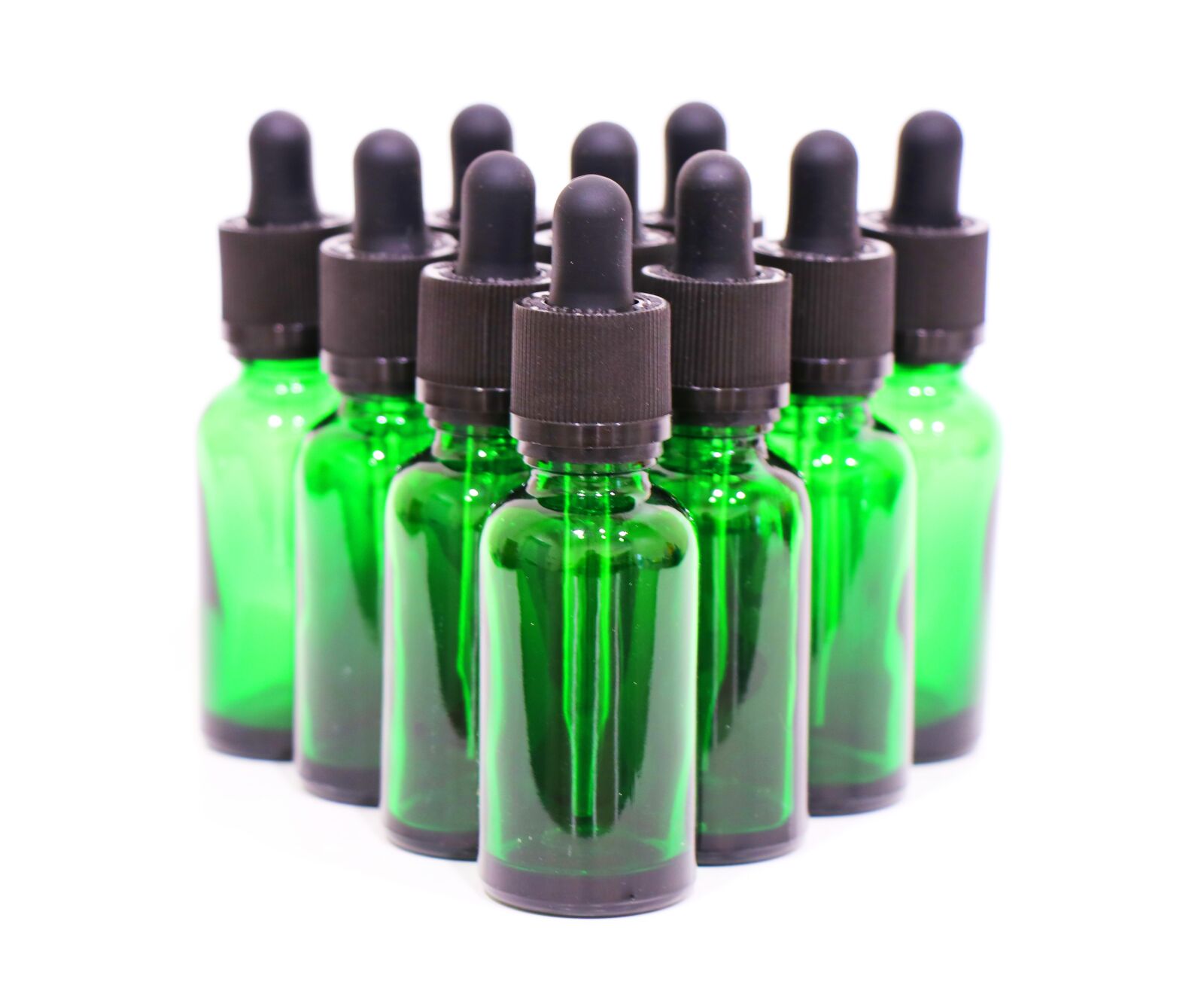 Canon EF-S 18-135mm F3.5-5.6 IS USM sample photo. Green, glass, dropper bottles photography
