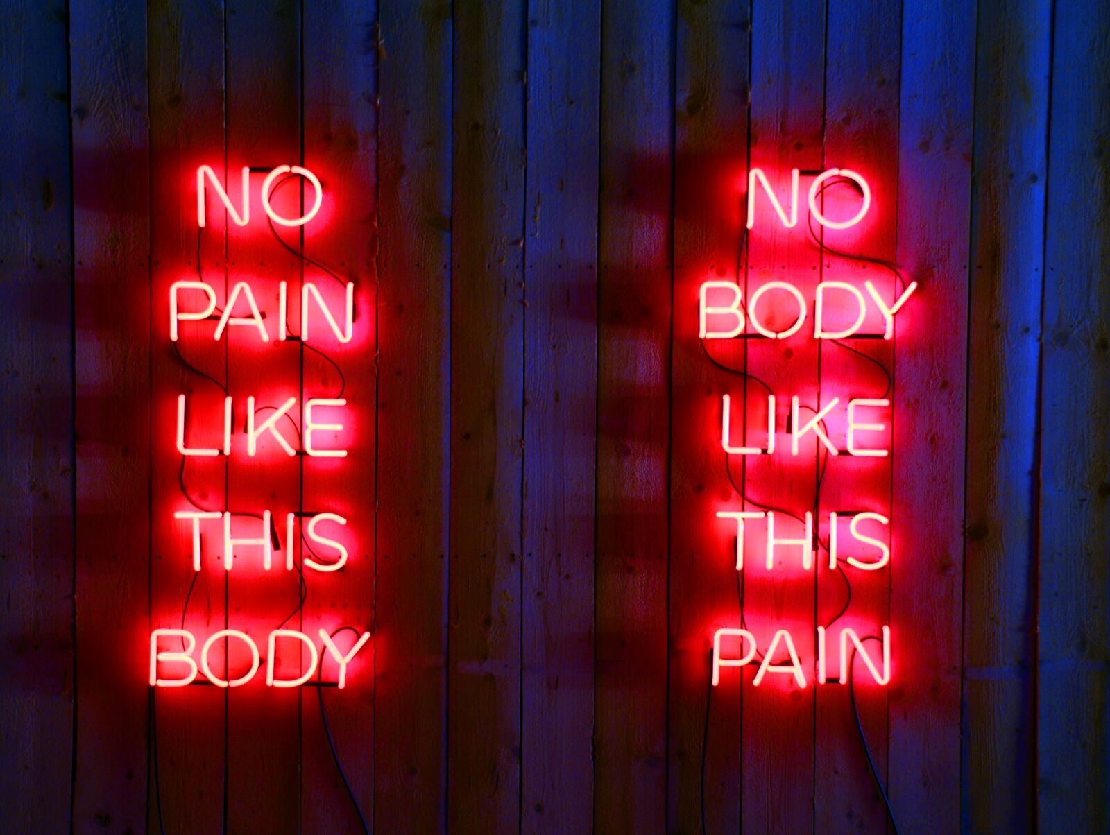 Nikon D7000 sample photo. Neon light, pain, body photography