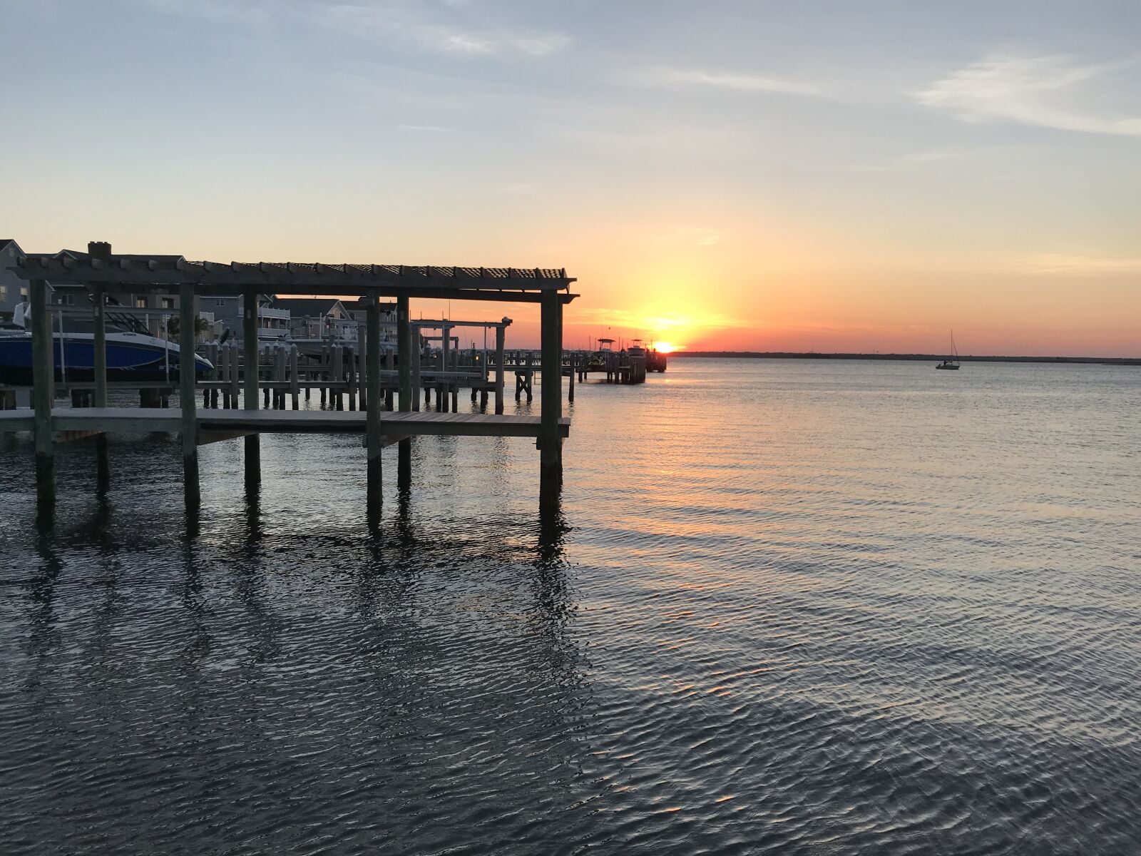iPhone 7 back camera 3.99mm f/1.8 sample photo. Sunset, water, dock photography