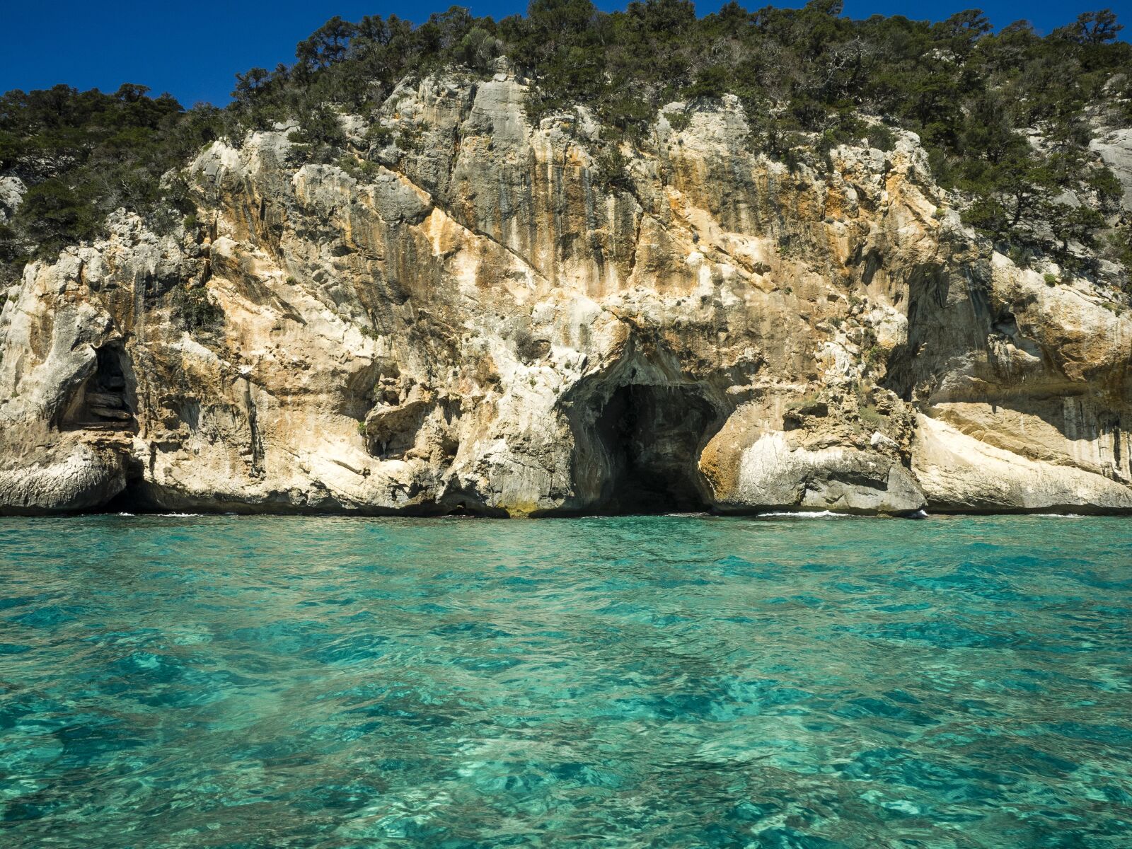 Olympus OM-D E-M1 + Olympus M.Zuiko Digital ED 12-40mm F2.8 Pro sample photo. Italy, cala gonone, air photography