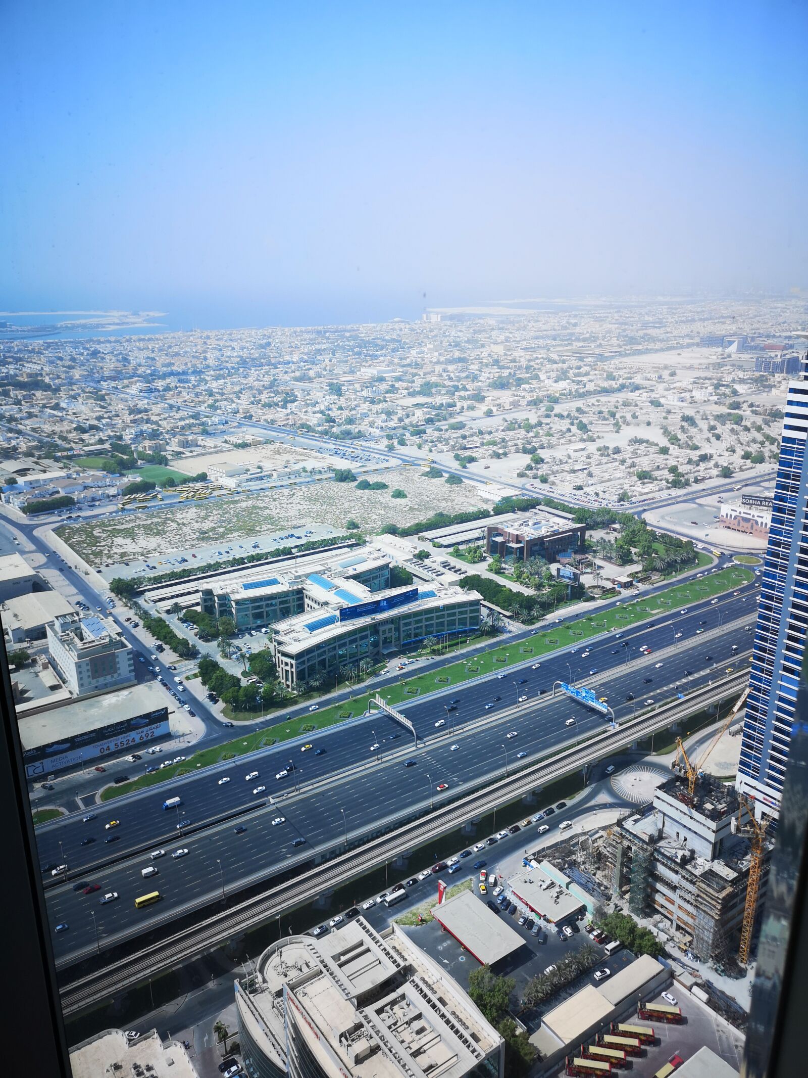 HUAWEI CLT-L29 sample photo. Dubai, traffic, rom above photography
