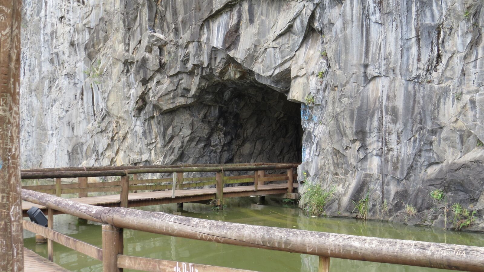 Canon PowerShot SX50 HS sample photo. Cave, rock, lake photography