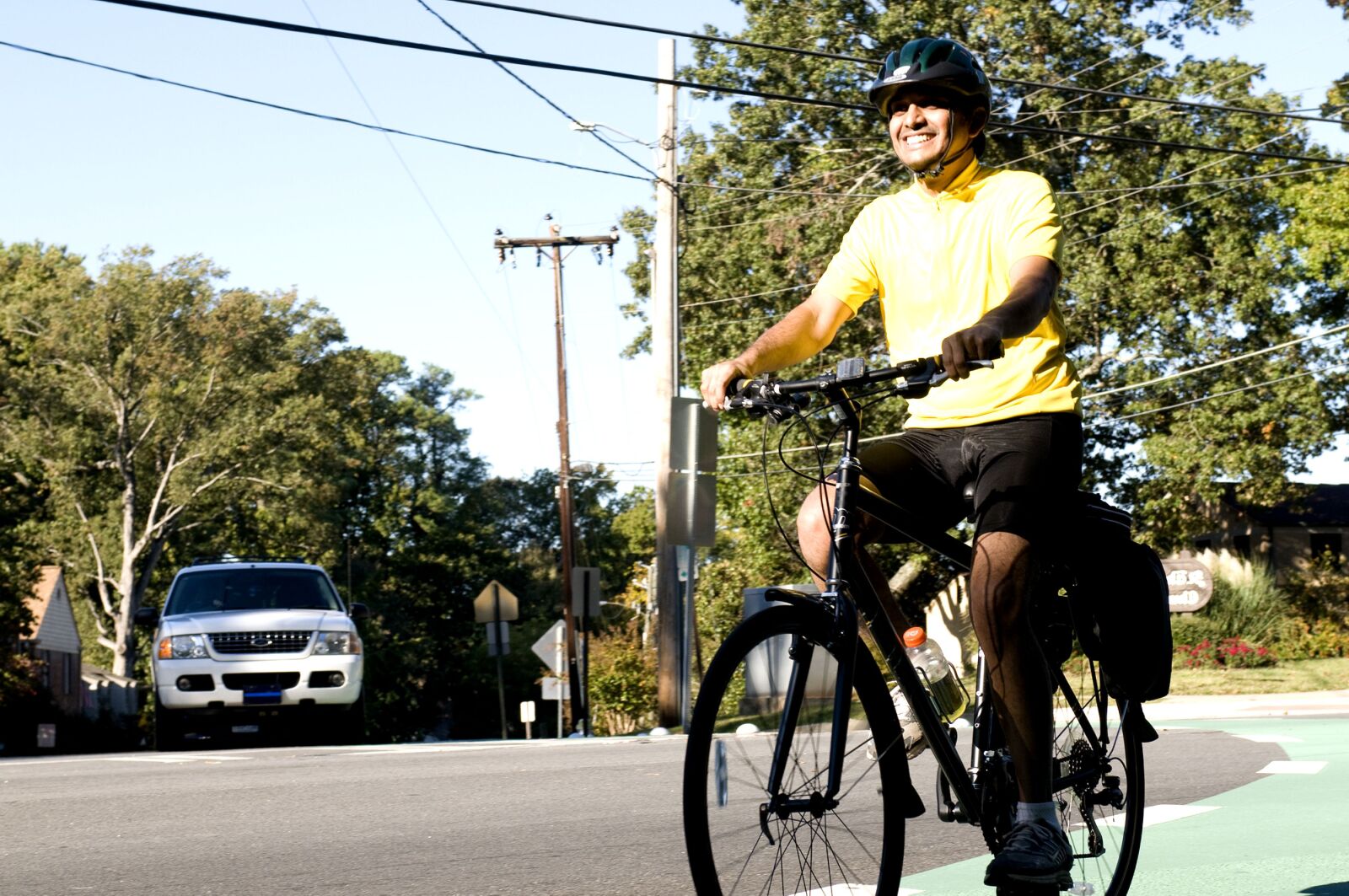 Nikon D300 sample photo. Male, bicyclist, embarked, morning photography