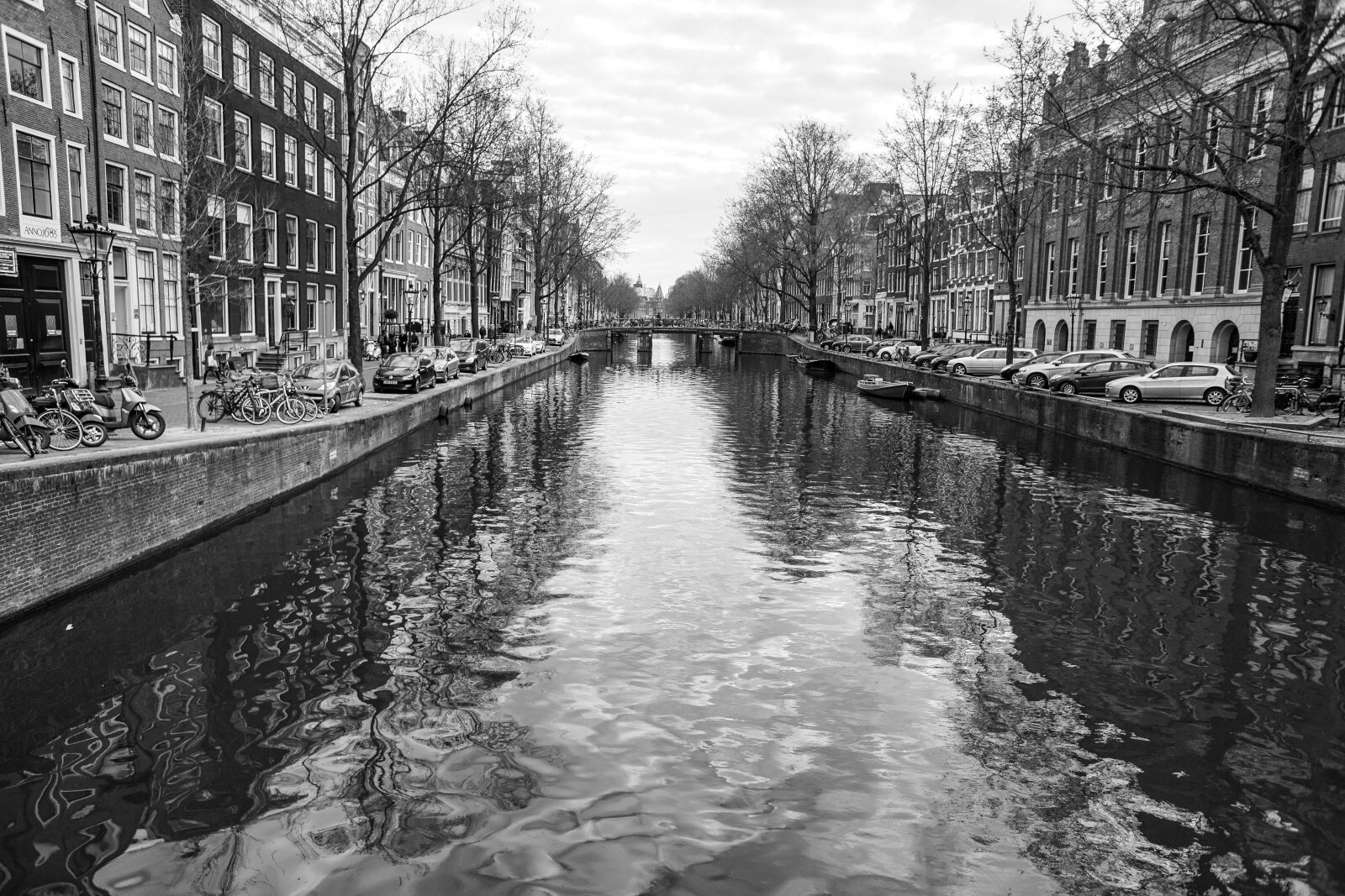 Sony a6000 + Sony E 16mm F2.8 sample photo. Amsterdam, river, channels photography