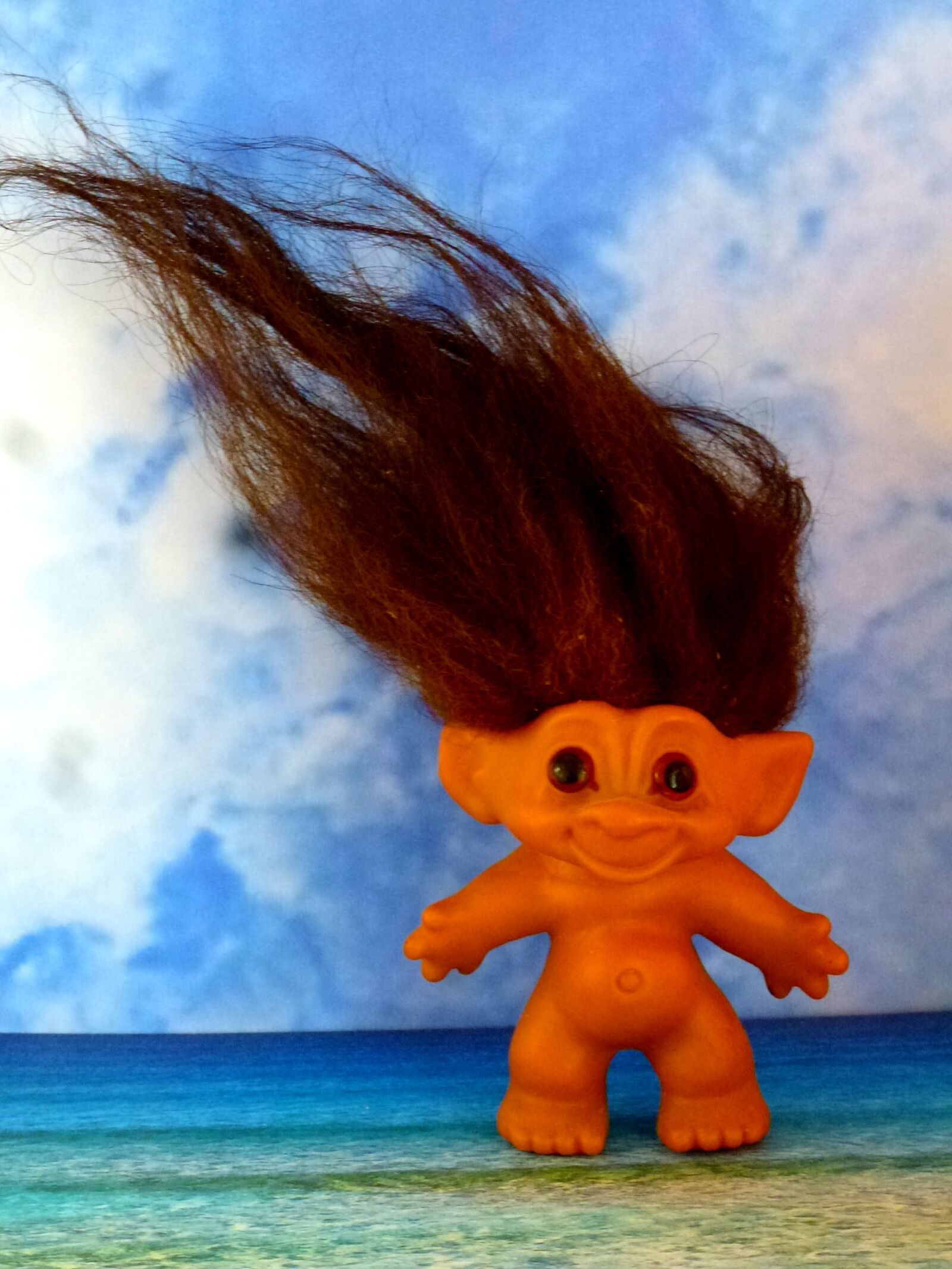 Panasonic Lumix DMC-ZS10 (Lumix DMC-TZ20 / Lumix DMC-TZ22) sample photo. Troll, seaside, clouds photography