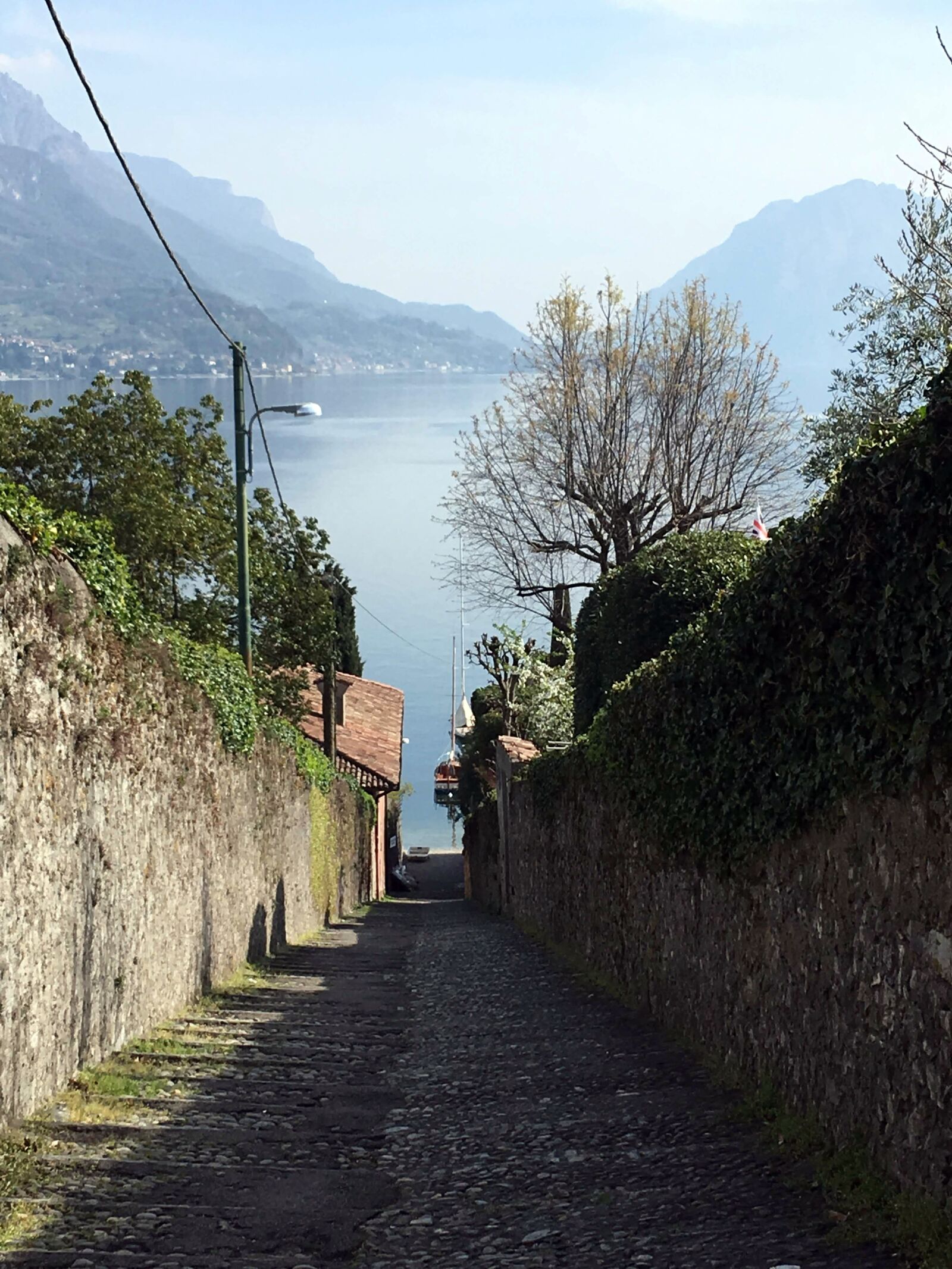 iPhone SE back camera 4.15mm f/2.2 sample photo. Bellagio, italy, lake photography