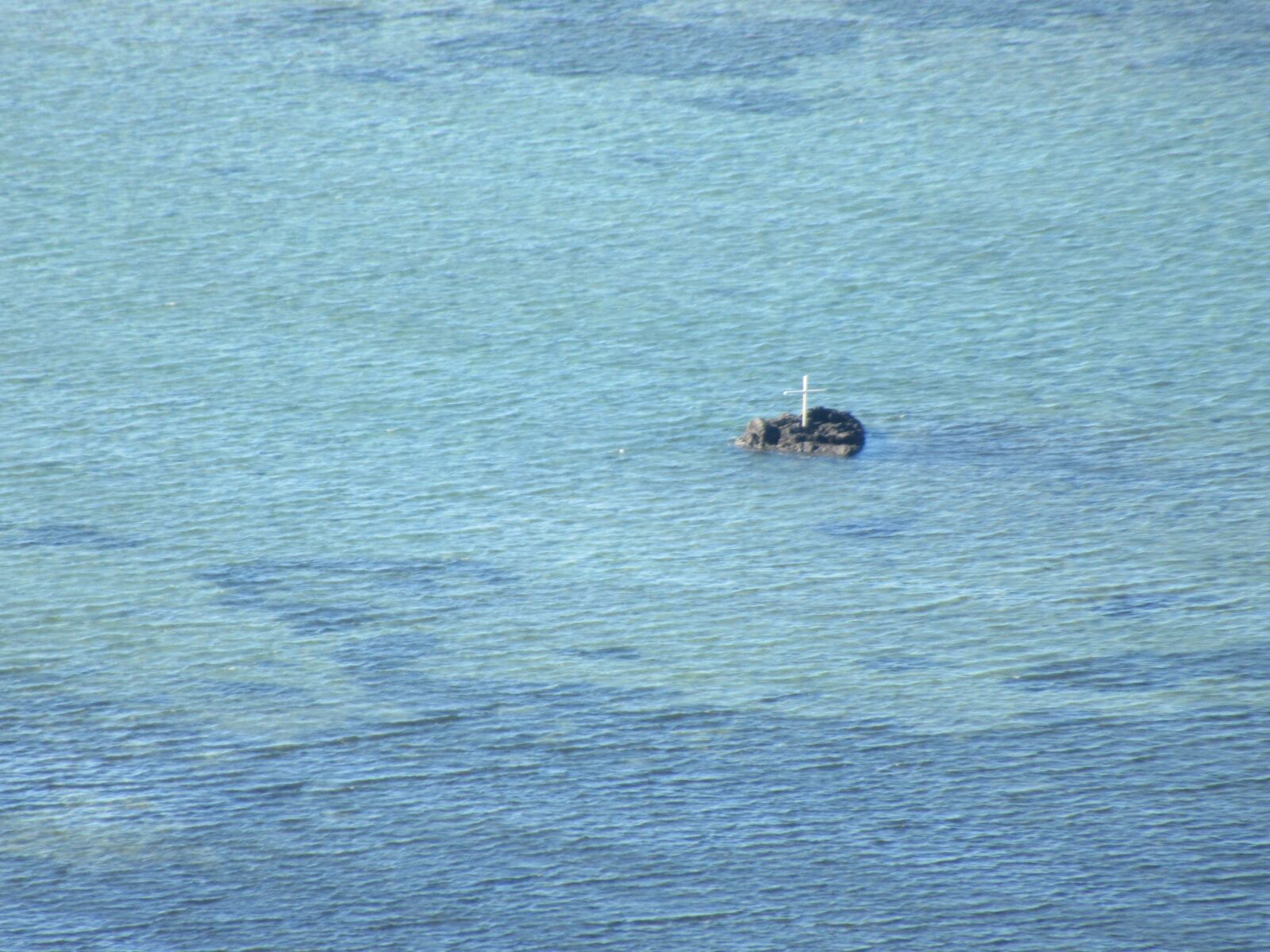 Canon PowerShot SX620 HS sample photo. Cross, sea, grave photography