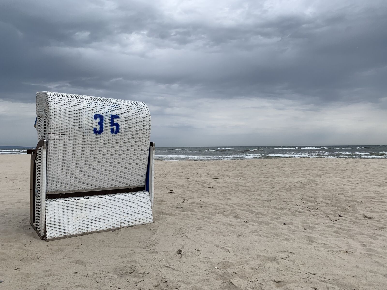iPhone XR back camera 4.25mm f/1.8 sample photo. Beach chair, baltic sea photography