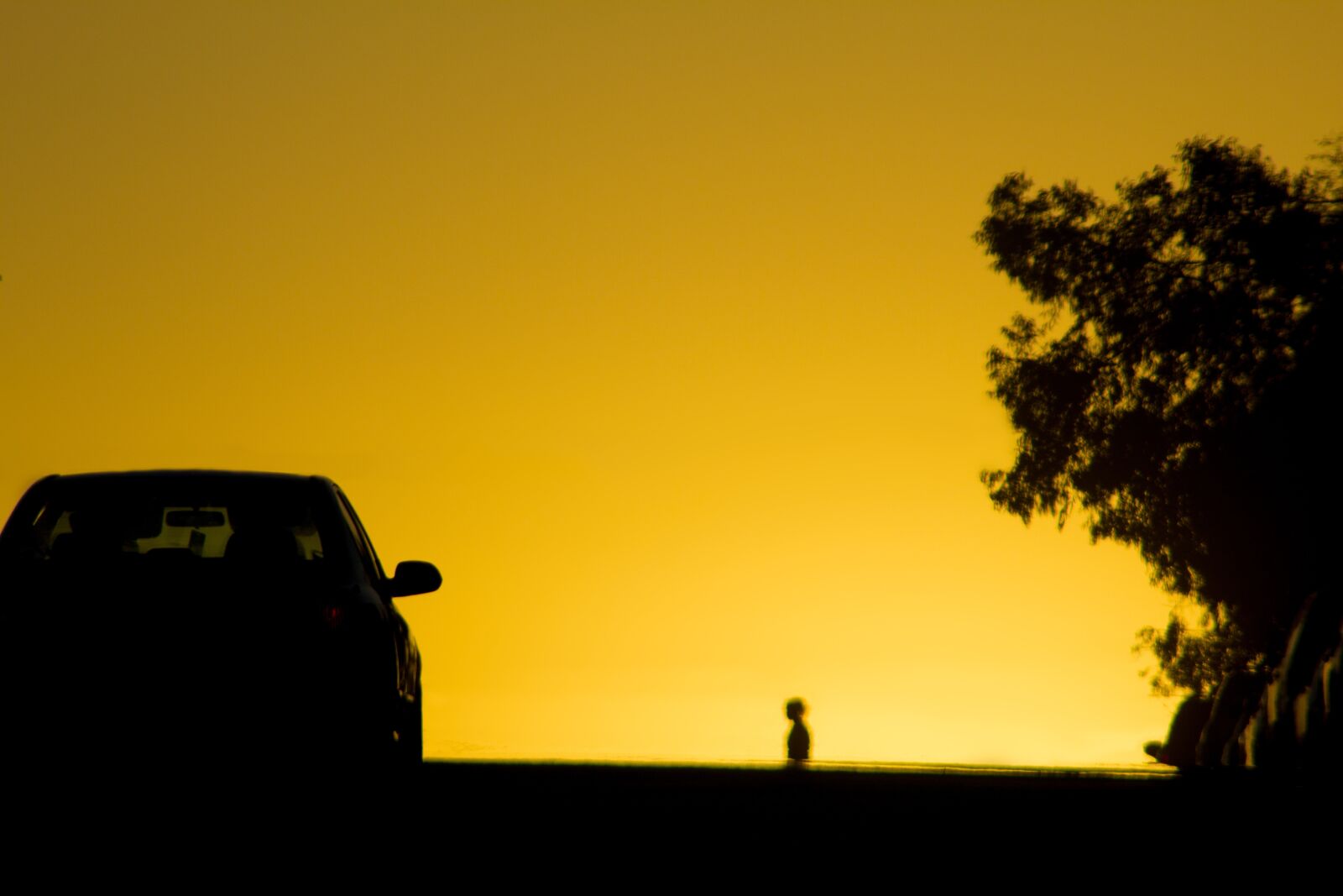 Canon EF 75-300mm f/4-5.6 sample photo. Sunset, city, orange photography