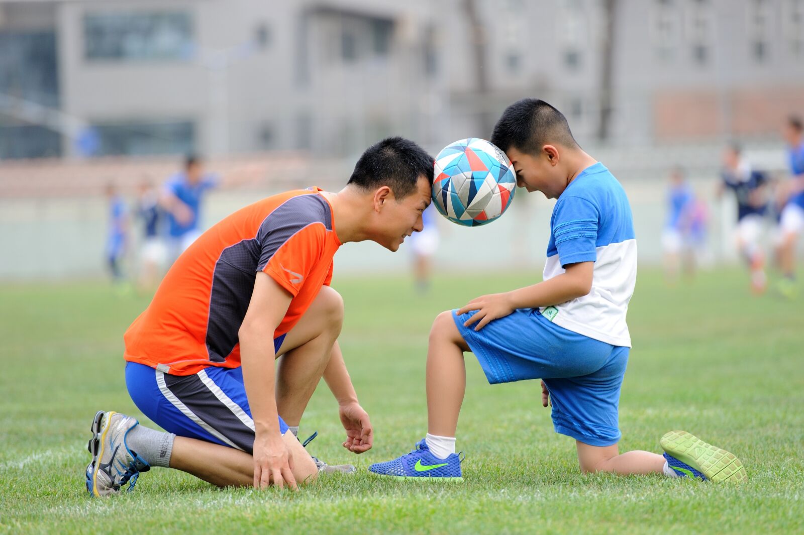 Nikon D700 sample photo. Football, teenager, greenery photography