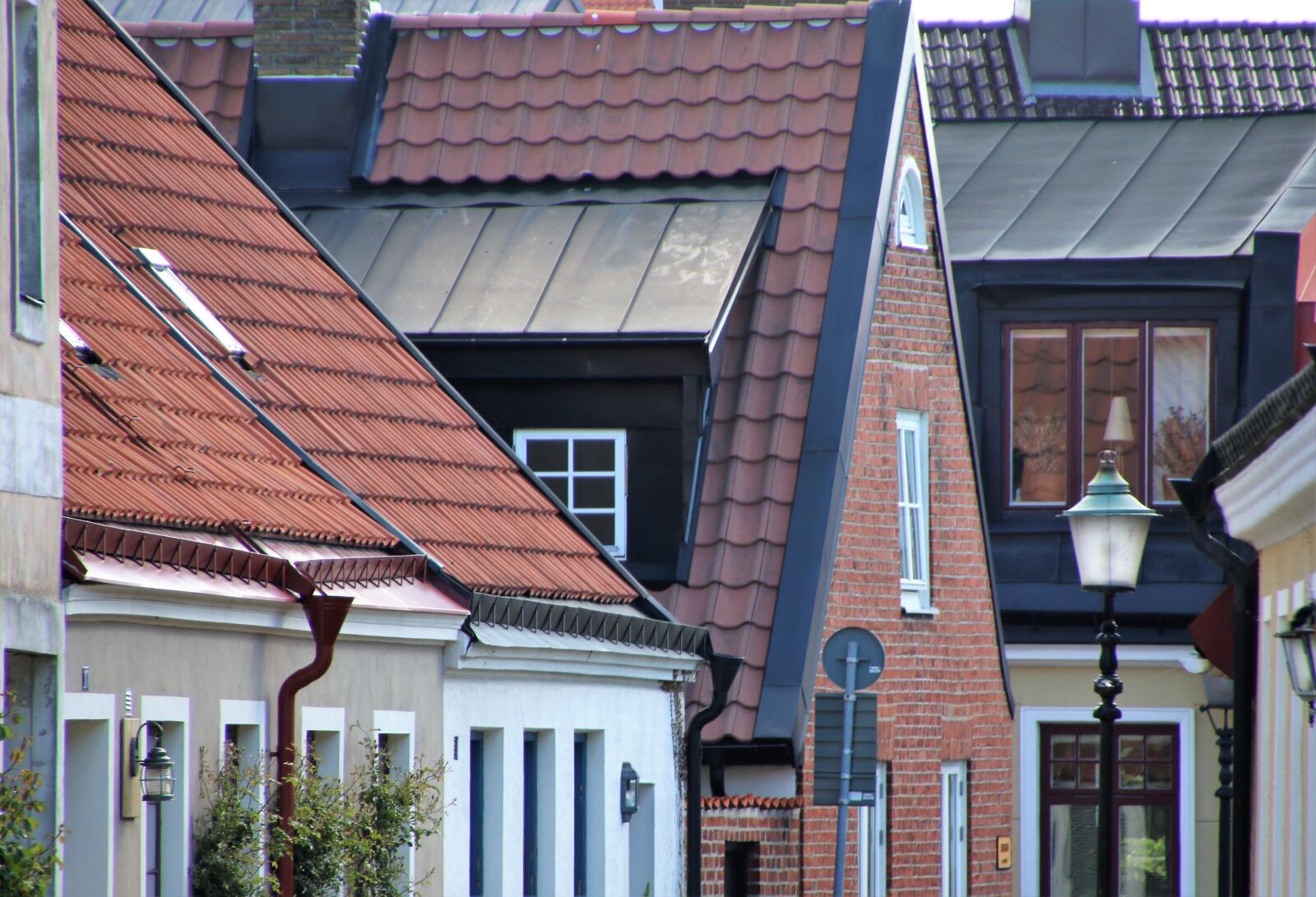 Canon EOS 7D Mark II sample photo. Bricks, chimneys, doors, homes photography