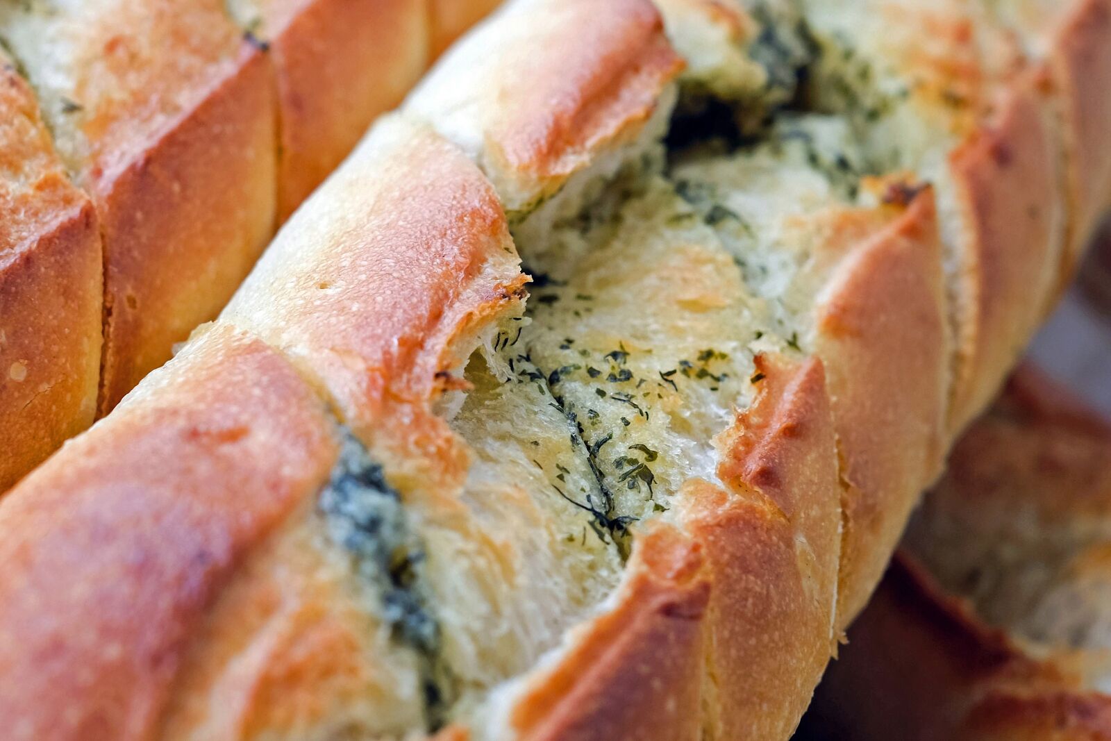 Fujifilm X-T10 + Fujifilm XF 35mm F1.4 R sample photo. Baguette, bread, herb baguette photography