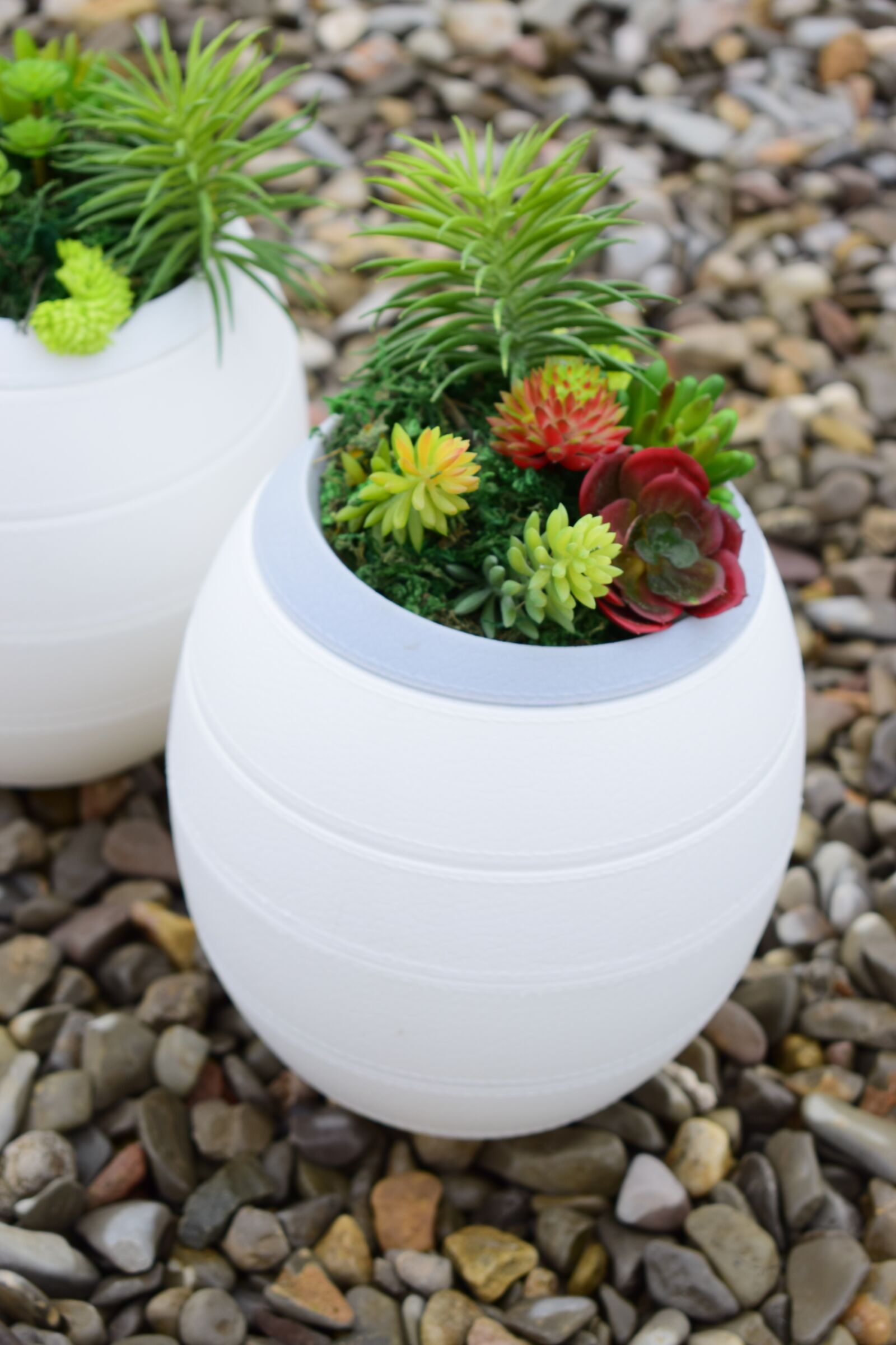 Nikon D3300 sample photo. Stones, plants, funeral urns photography