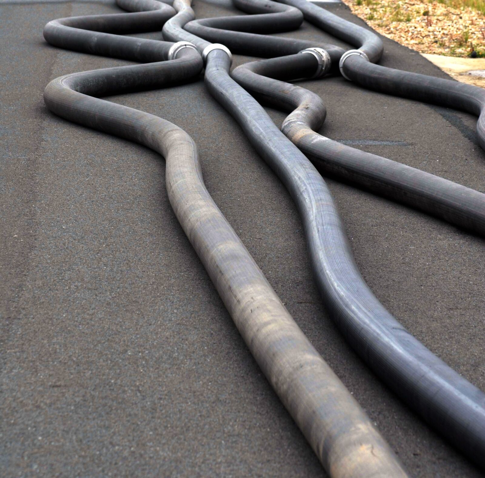 Nikon D200 sample photo. Fire hose, asphalt, water photography