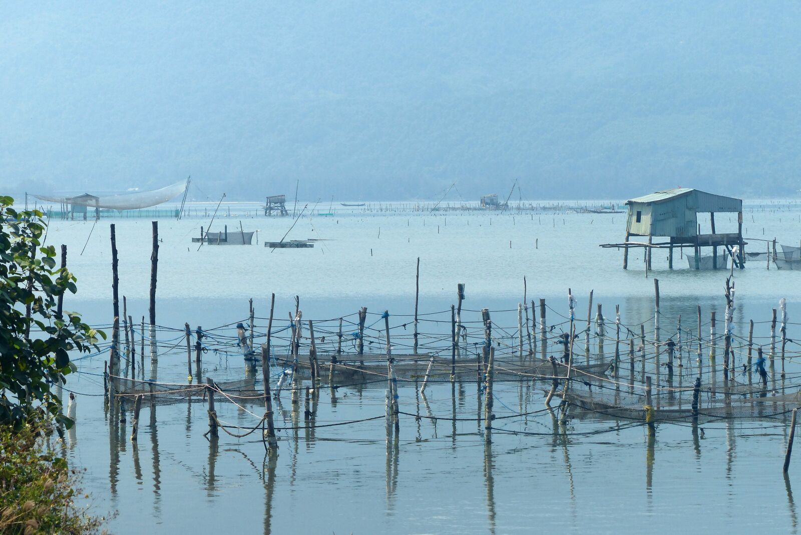 Panasonic Lumix DMC-FZ200 sample photo. Vietnam, fisherman, fishing photography