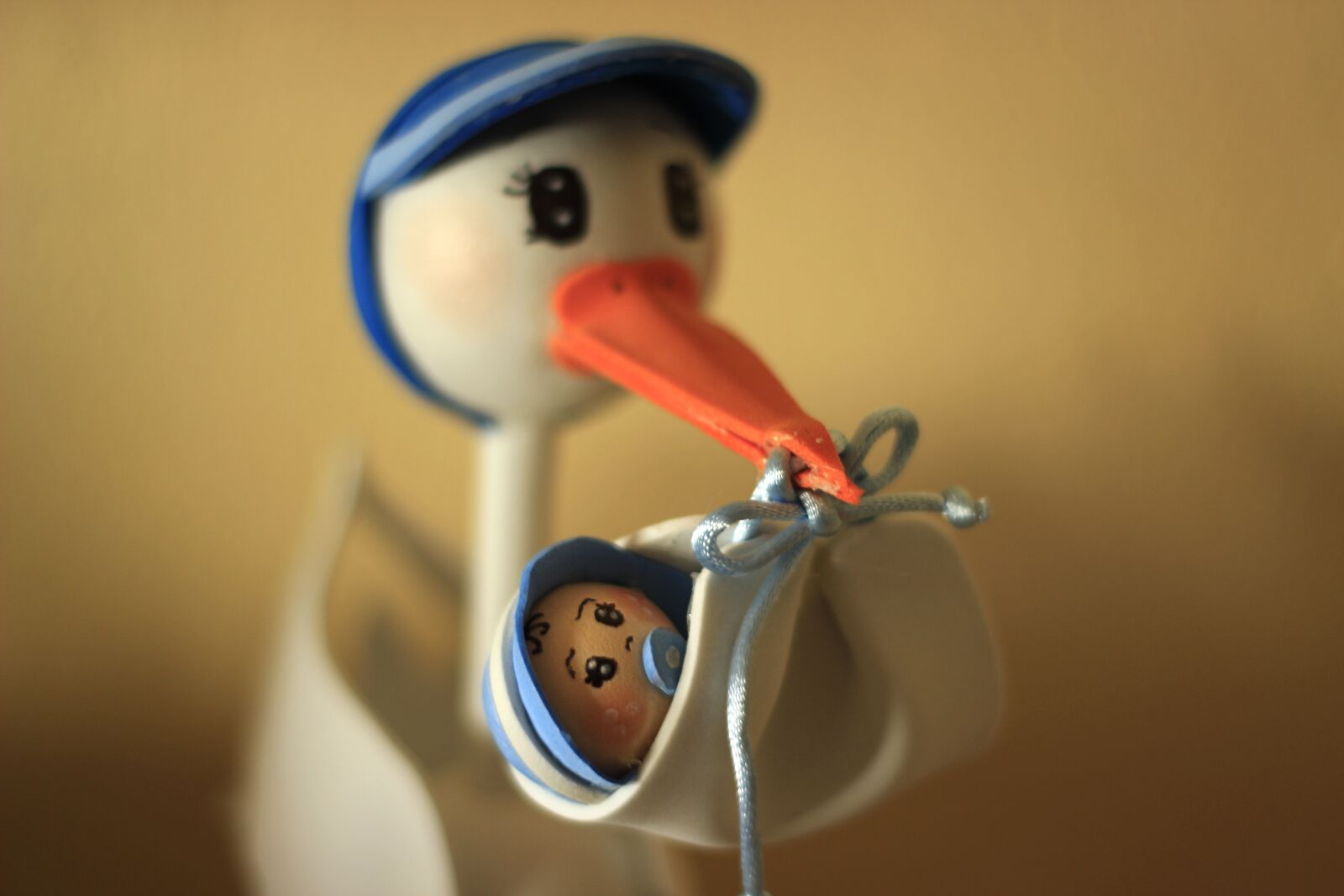 Canon EOS 600D (Rebel EOS T3i / EOS Kiss X5) + Canon EF 50mm F1.8 II sample photo. Baby, stork, snowman photography