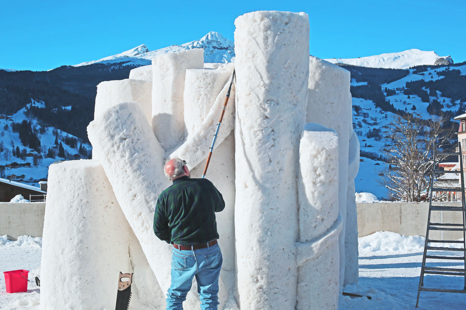 Canon EF 50mm F1.4 USM sample photo. Mountains, people, sculpture, snow photography