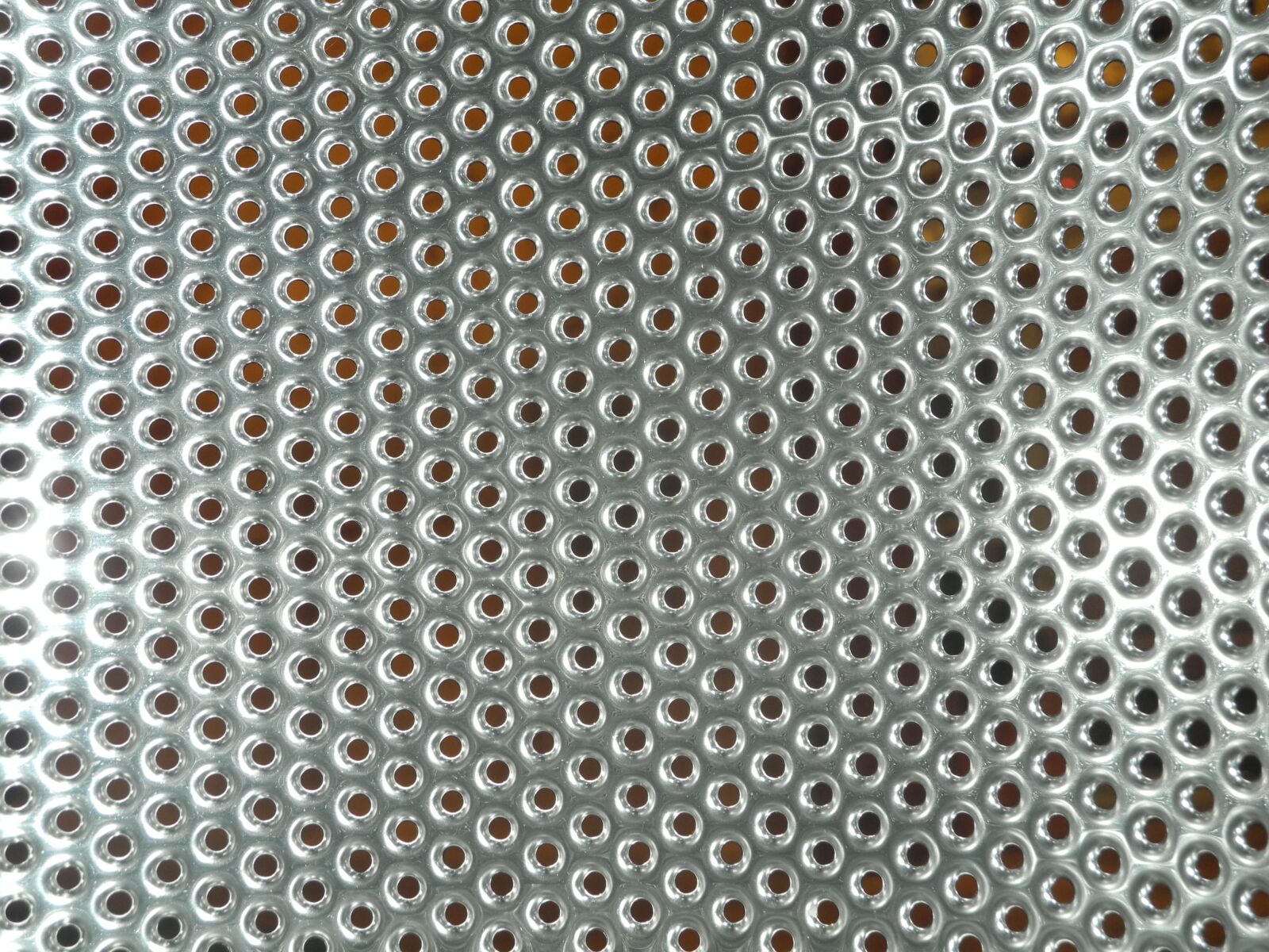 Nikon Coolpix P7000 sample photo. Sheet, washing machine, holes photography