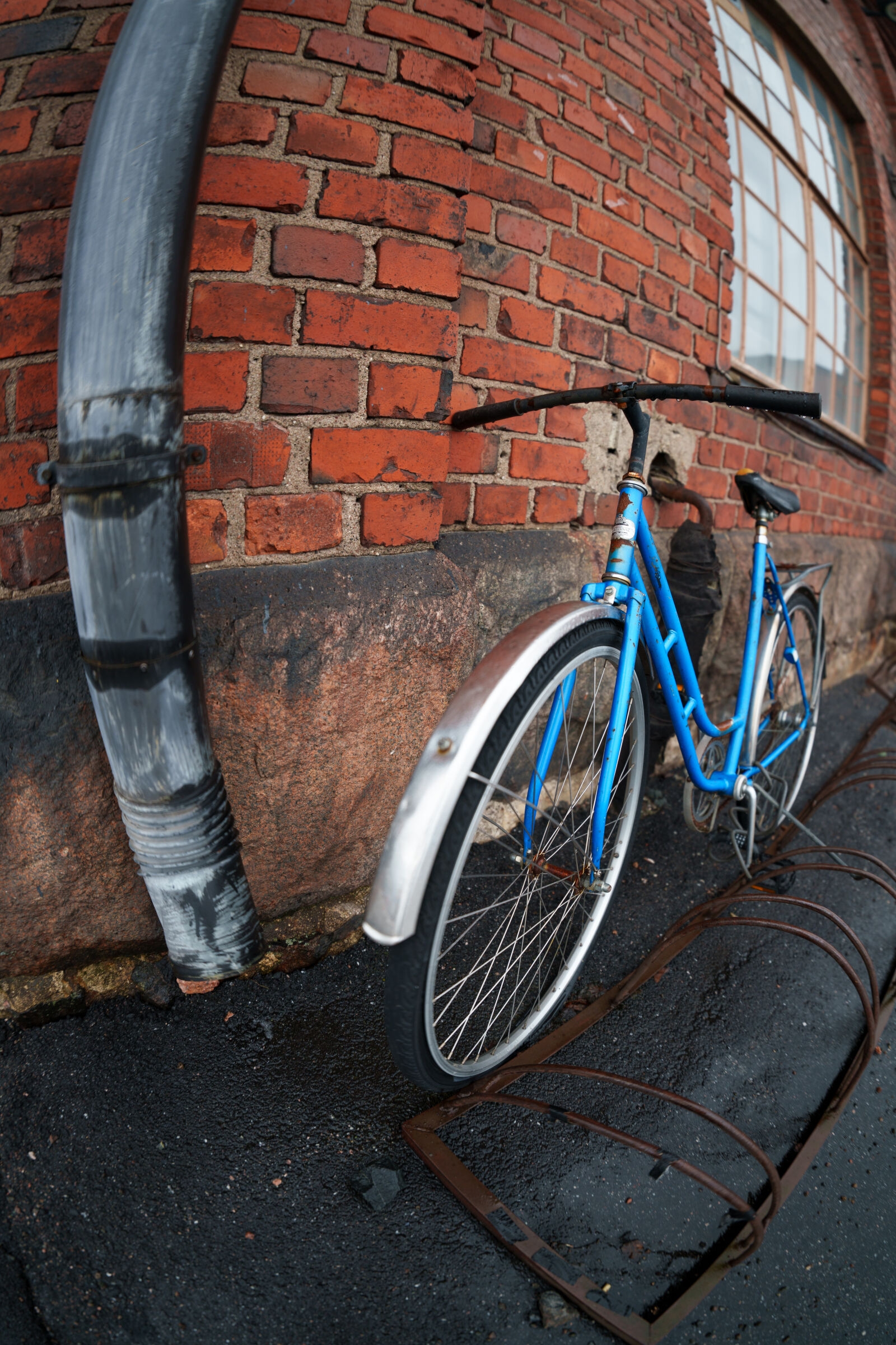 Sony a7R V sample photo. Bicycle by the wall photography