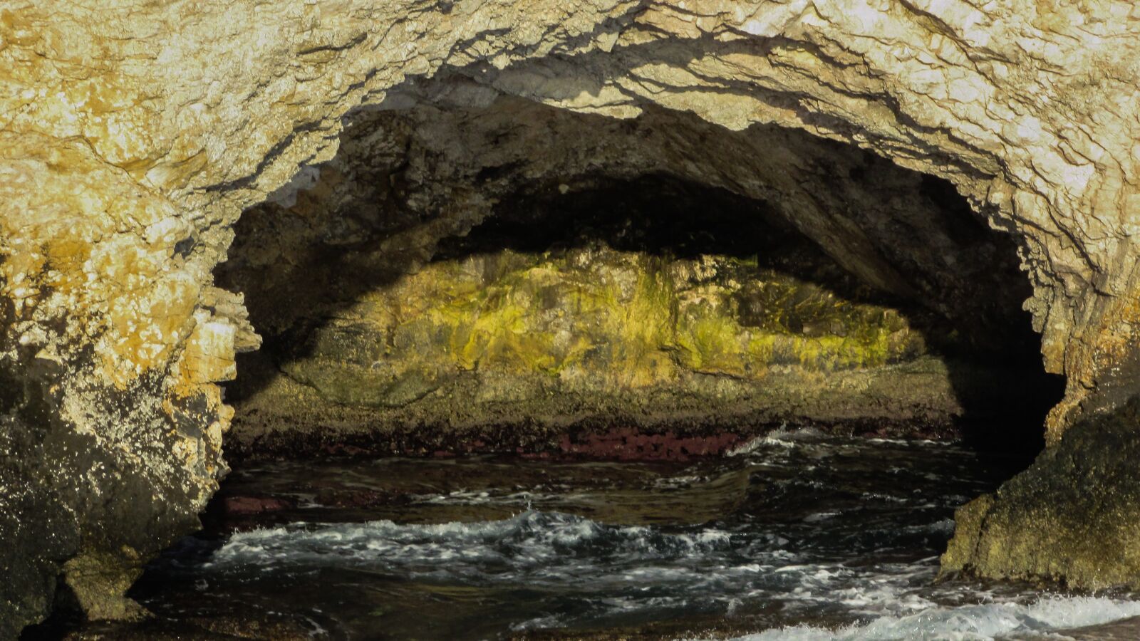 Canon PowerShot SX400 IS sample photo. Sea cave, waves, rocky photography