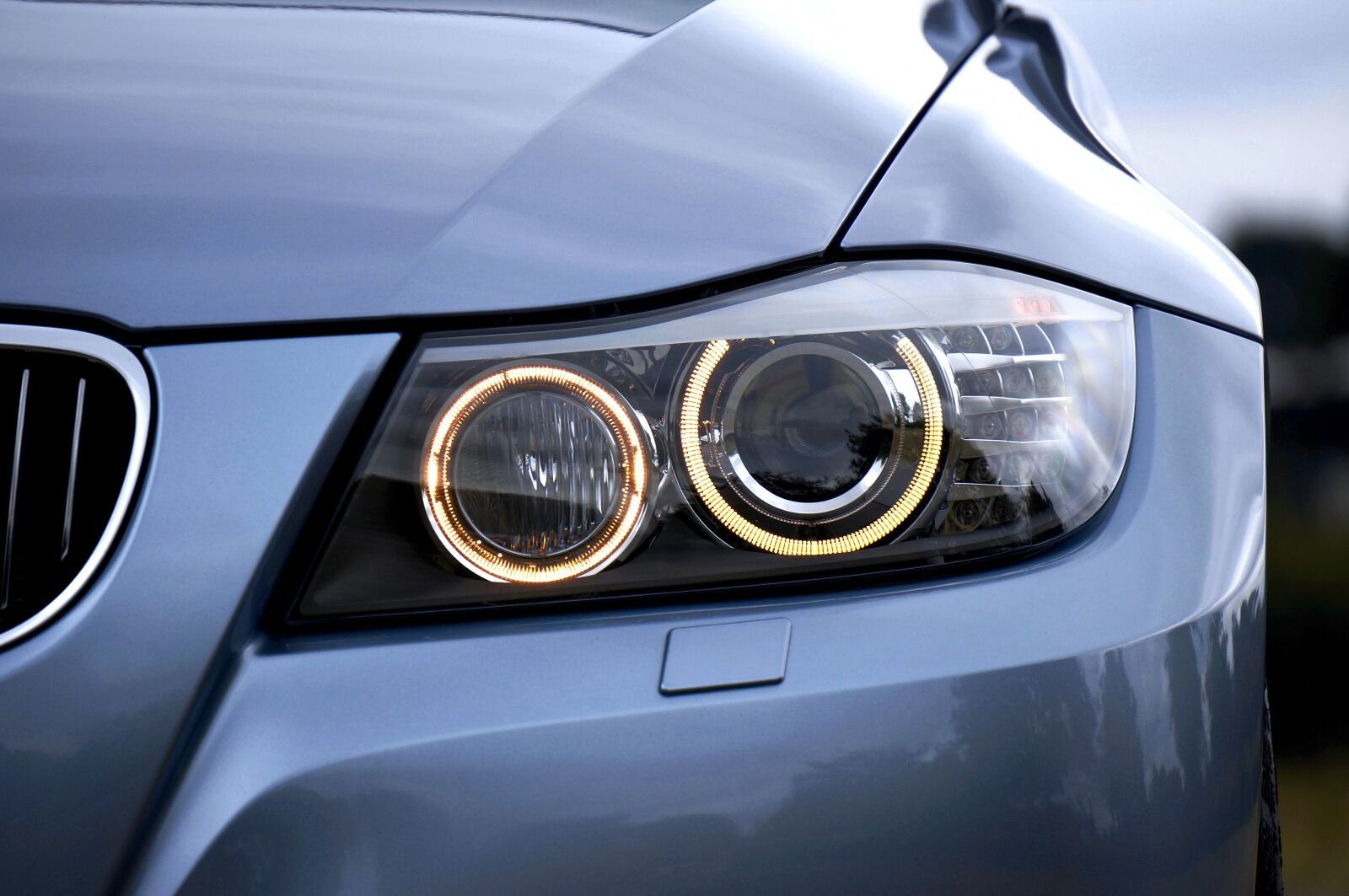 Sony Alpha NEX-5N + Sony E 55-210mm F4.5-6.3 OSS sample photo. Headlight, bmw, auto photography