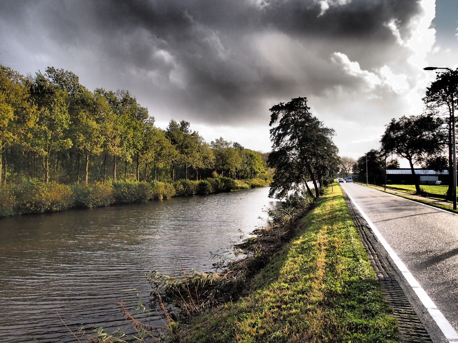 Olympus PEN E-PL3 sample photo. Netherlands, canal, clouds photography