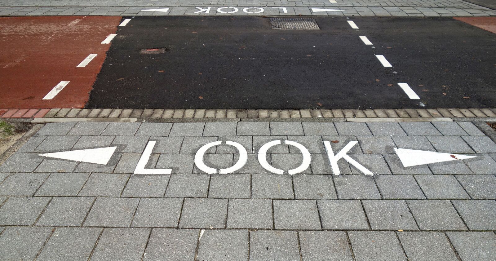 Sony Cyber-shot DSC-RX100 sample photo. Text, sidewalk, crossing photography