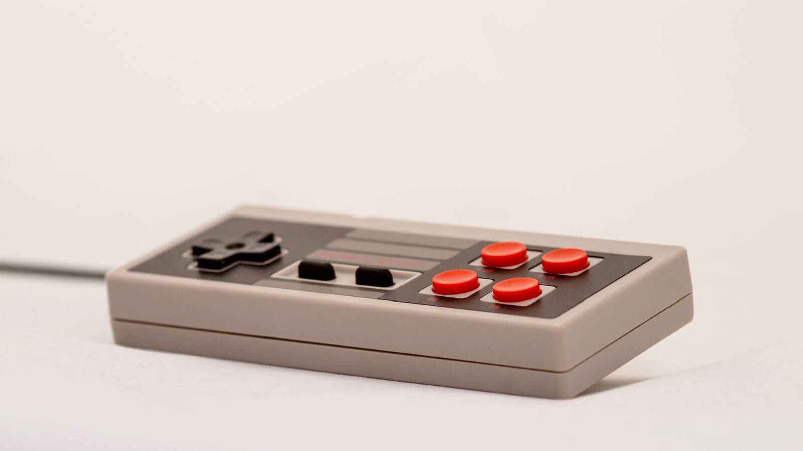 Sony SLT-A58 sample photo. Game, game controller, controller photography