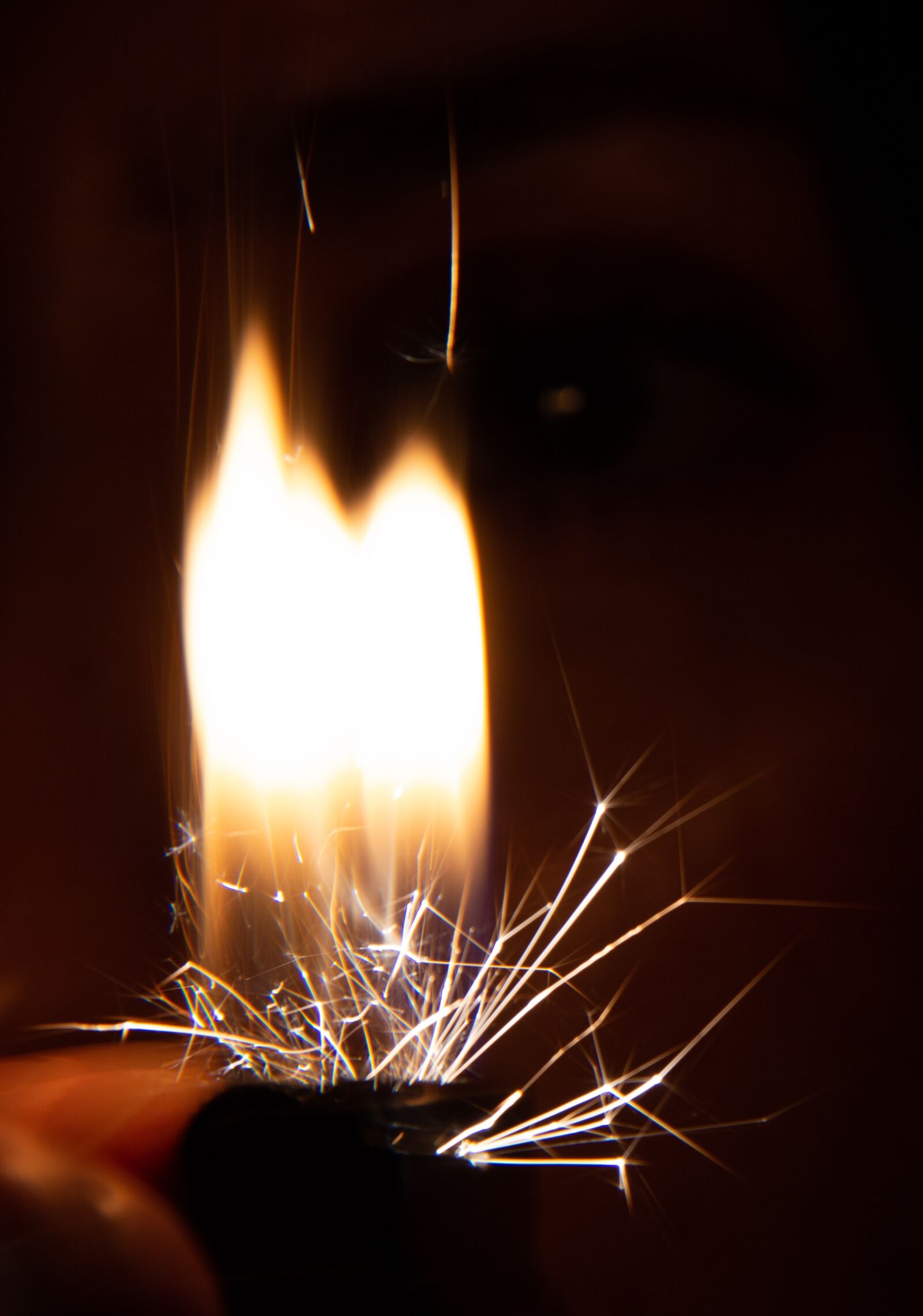 Canon EF-S 18-135mm F3.5-5.6 IS sample photo. Lighter, light, sparks photography