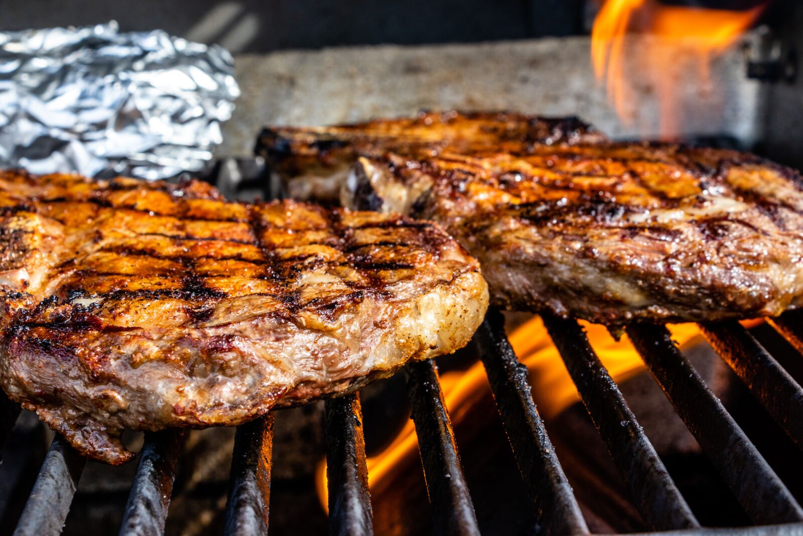 Canon EF-S 18-135mm F3.5-5.6 IS USM sample photo. Steaks on the grill photography