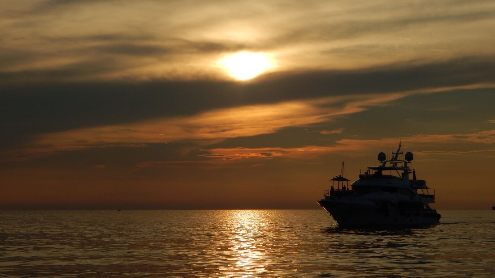 Nikon Coolpix L830 sample photo. Trieste, sunset, clouds photography