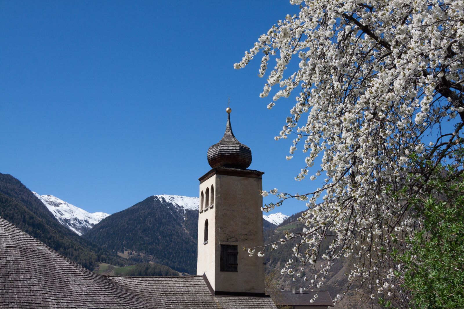 Canon EF-S 17-85mm F4-5.6 IS USM sample photo. Steeple, rhaeto romanic, church photography