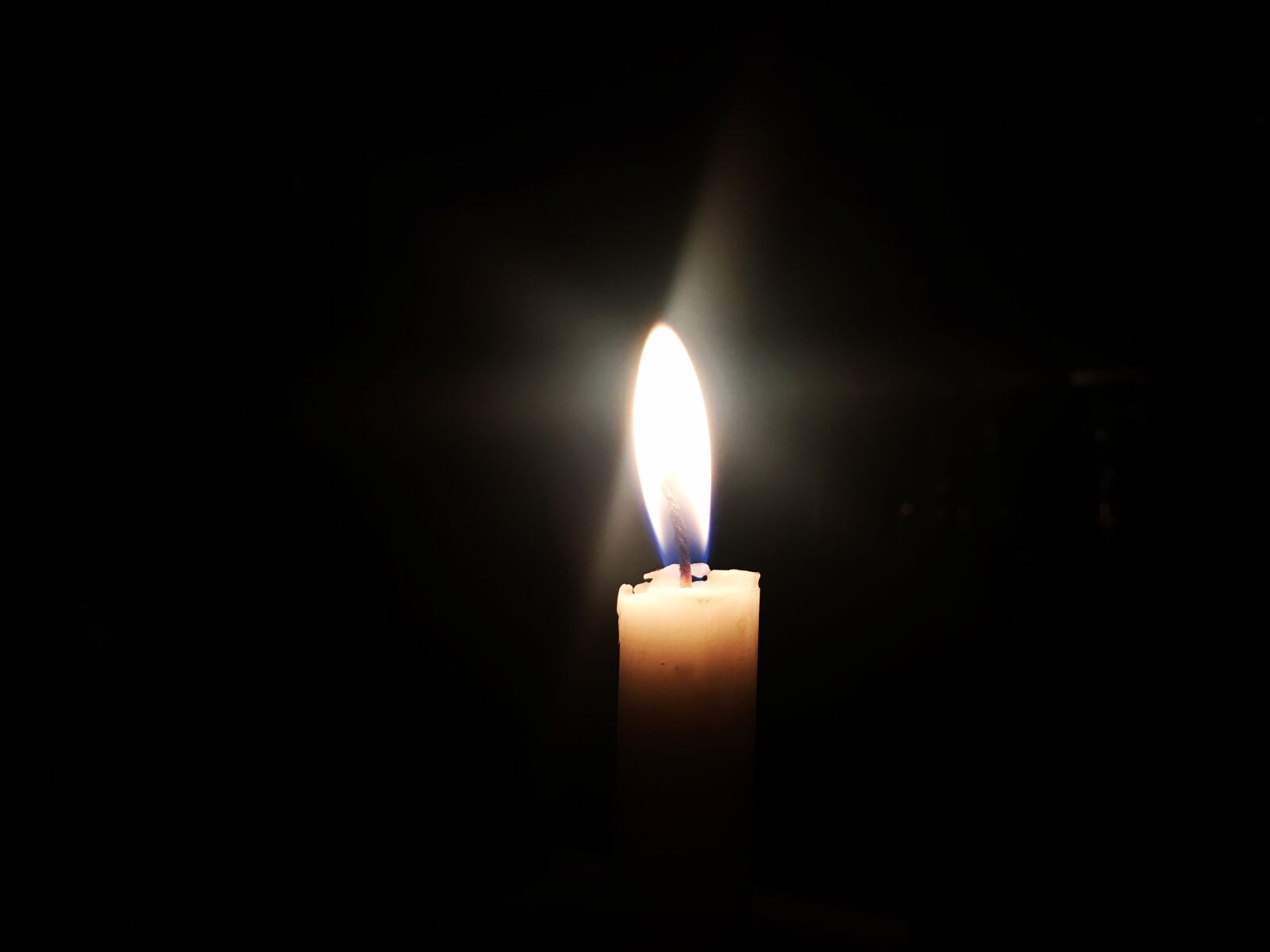 iPhone SE back camera 4.15mm f/2.2 sample photo. Candle, light, torch photography